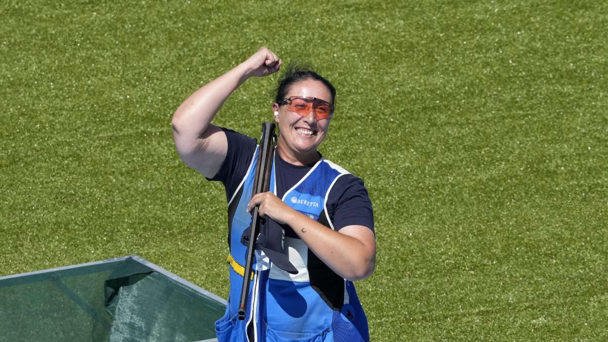 Italy's Diana Bacosi celebrates after winning the gold medal with teammate Gabriele Rossetti in the Skeet mixed team final at the 2024 Summer Olympics, Monday, Aug. 5, 2024, in Chateauroux, France.