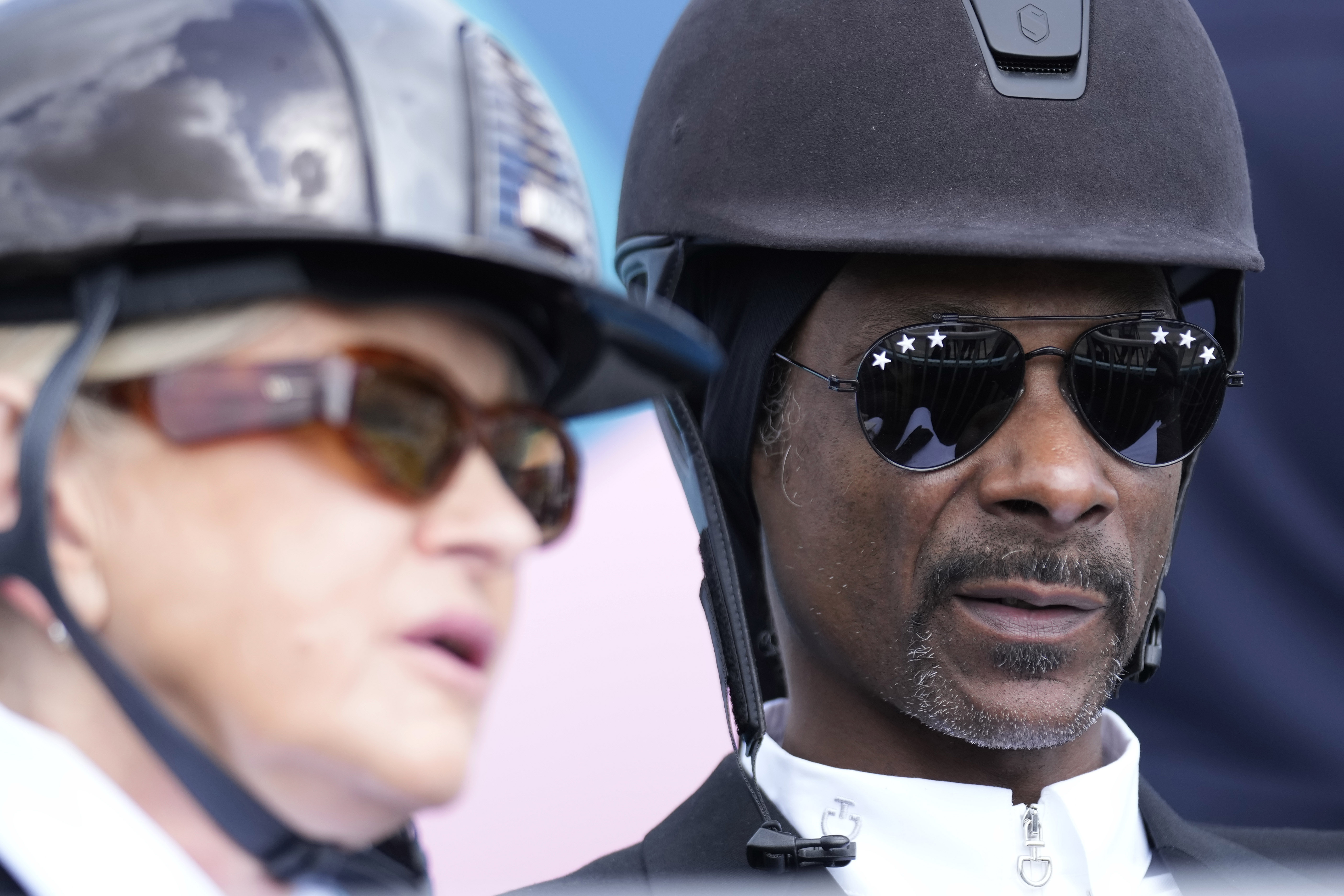 Snoop Dogg and Martha Stewart watch the dressage team Grand Prix final, at the 2024 Summer Olympics, Saturday, Aug. 3, 2024, in Versailles, France. 