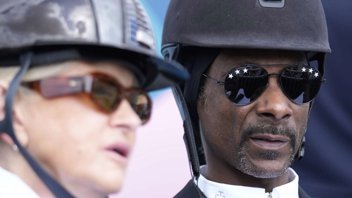 Snoop Dogg and Martha Stewart watch the dressage team Grand Prix final, at the 2024 Summer Olympics, Saturday, Aug. 3, 2024, in Versailles, France.