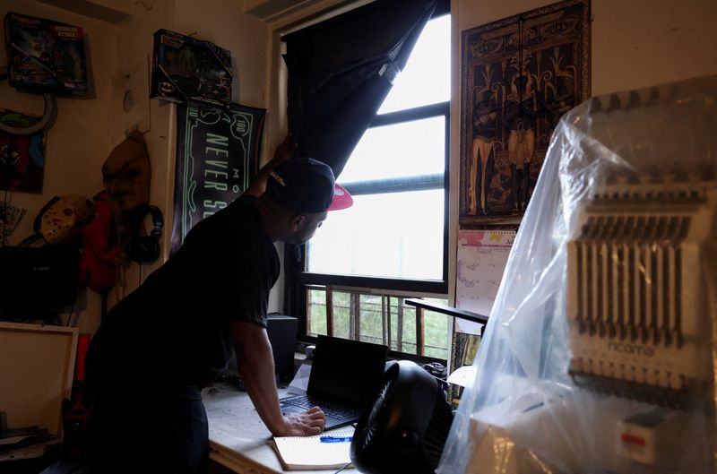 Anthony Gay stands at 11 McKeever Place in New York City July 26.