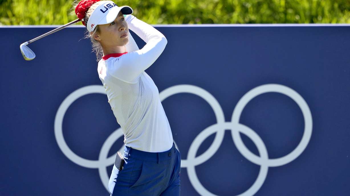 Nelly Korda, of the United States, hits from the eighth tee during a practice round for the women's golf event at the 2024 Summer Olympics, Monday, Aug. 5, 2024, at Le Golf National in Saint-Quentin-en-Yvelines, France.