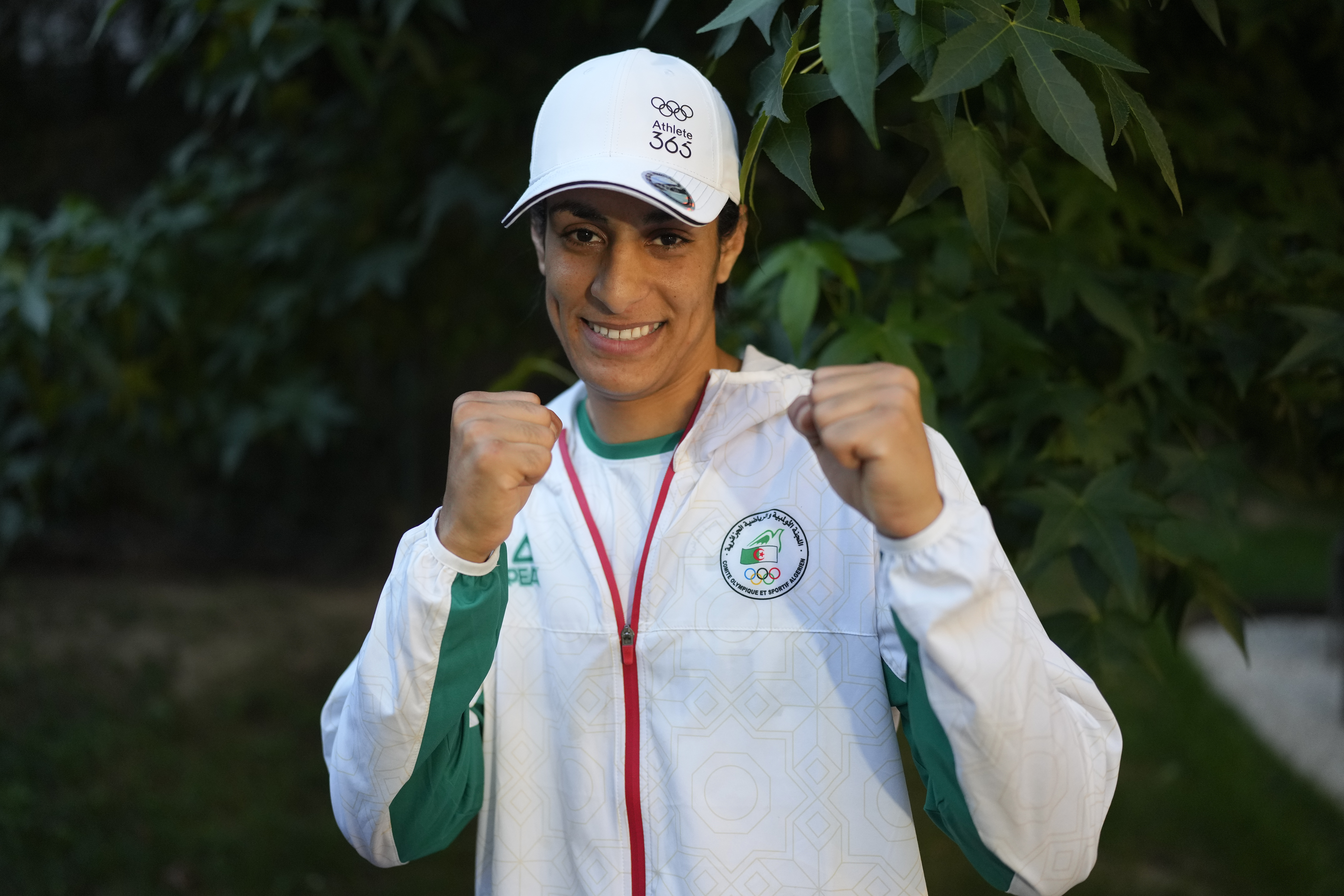 Algerian boxer Imane Khelif poses for a photo after an interview with SNTV at the 2024 Summer Olympics, Sunday, Aug. 4, 2024, in Paris, France. 