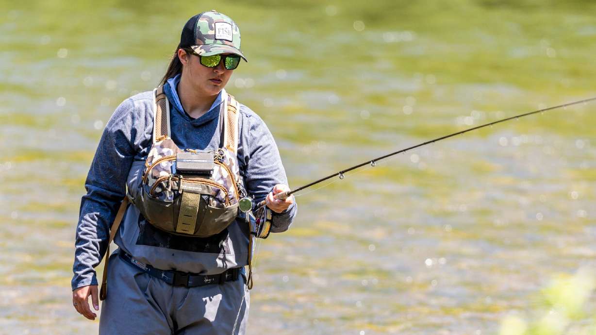 Kristen Almond, of Ashville, N.C., fishes along the Provo River near Vivian Park in Provo Canyon on July 17. USA Today recently compiled a list of the 10 best rivers in the United States for fly-fishing enthusiasts.