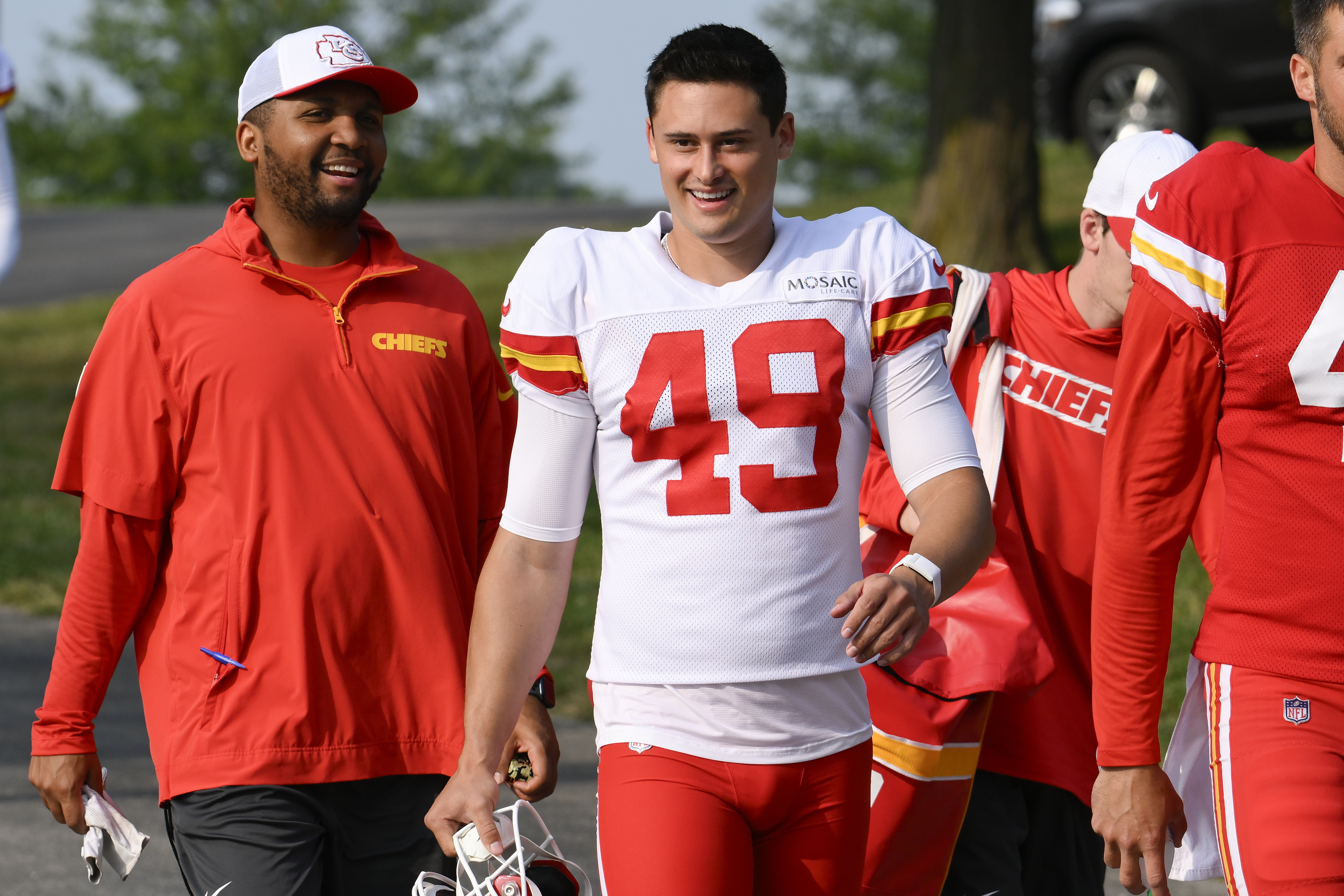 Kansas City Chiefs punter Matt Araiza (49) walks to the field at the start of an NFL football training camp Saturday, July 27, 2024, in St. Joseph, Mo. 