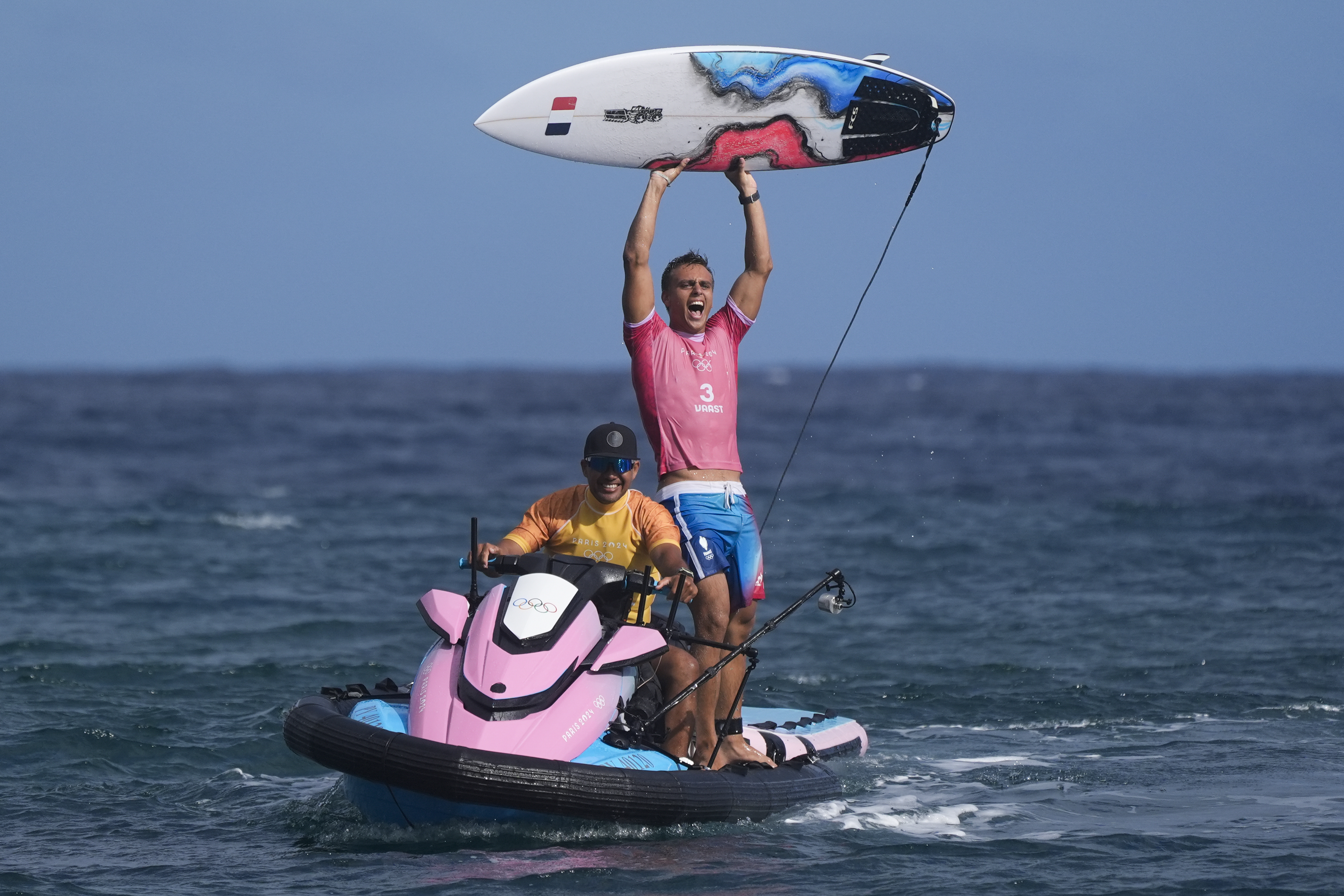 Kauli Vaast, of France, celebrates after winning the gold medal match of the surfing competition at the 2024 Summer Olympics, Monday, Aug. 5, 2024, in Teahupo'o, Tahiti. 