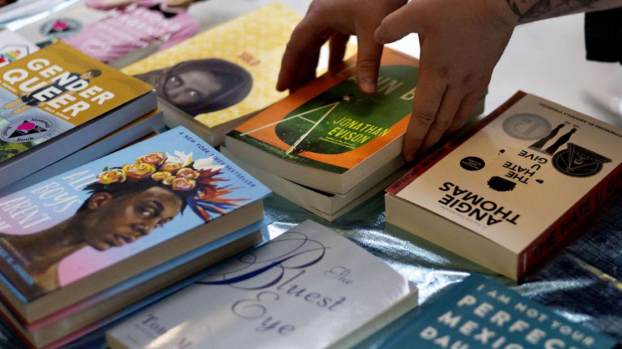 Books that have been challenged or banned at an event at the Capitol in Salt Lake City on Jan. 25, 2023. The Utah State Board of Education's decision to remove 13 books from every public school library in the state prompted strong reactions.