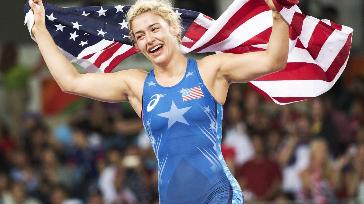 FILE - United States' Helen Louise Maroulis celebrates after beating Japan's Saori Yoshida for the gold medal during the women's wrestling freestyle 53-kg competition at the 2016 Summer Olympics in Rio de Janeiro, Brazil, Aug. 18, 2016.