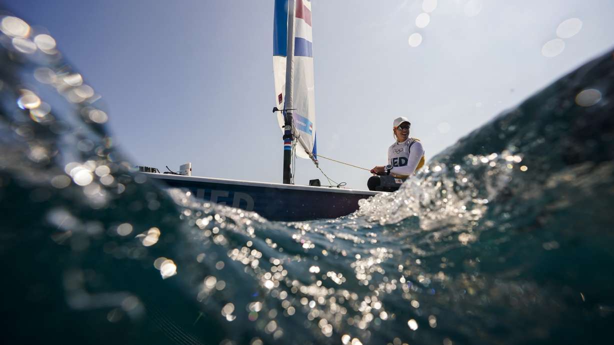 Marit Bouwmeester of the Netherlands sails back to the harbour after ILCA 6 dinghy class final race was postponed during the 2024 Summer Olympics, Tuesday, Aug. 6, 2024, in Marseille, France.