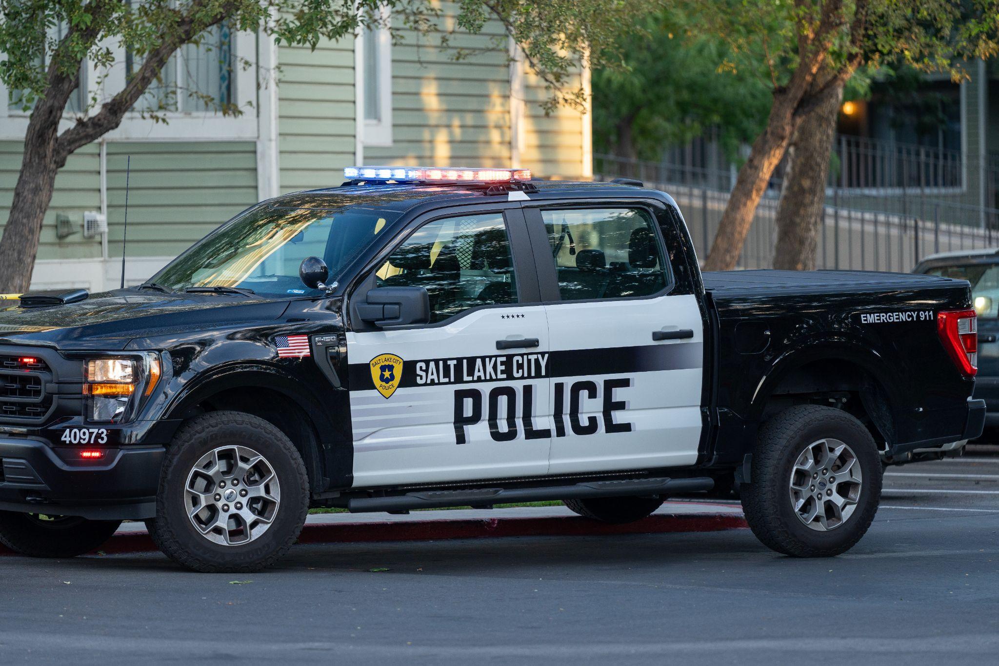 A Salt Lake City police truck parked at the scene of a homicide investigation near 1600 W. Snow Queen Place Tuesday. A 31-year-old man was arrested on suspicion of murder on Friday.