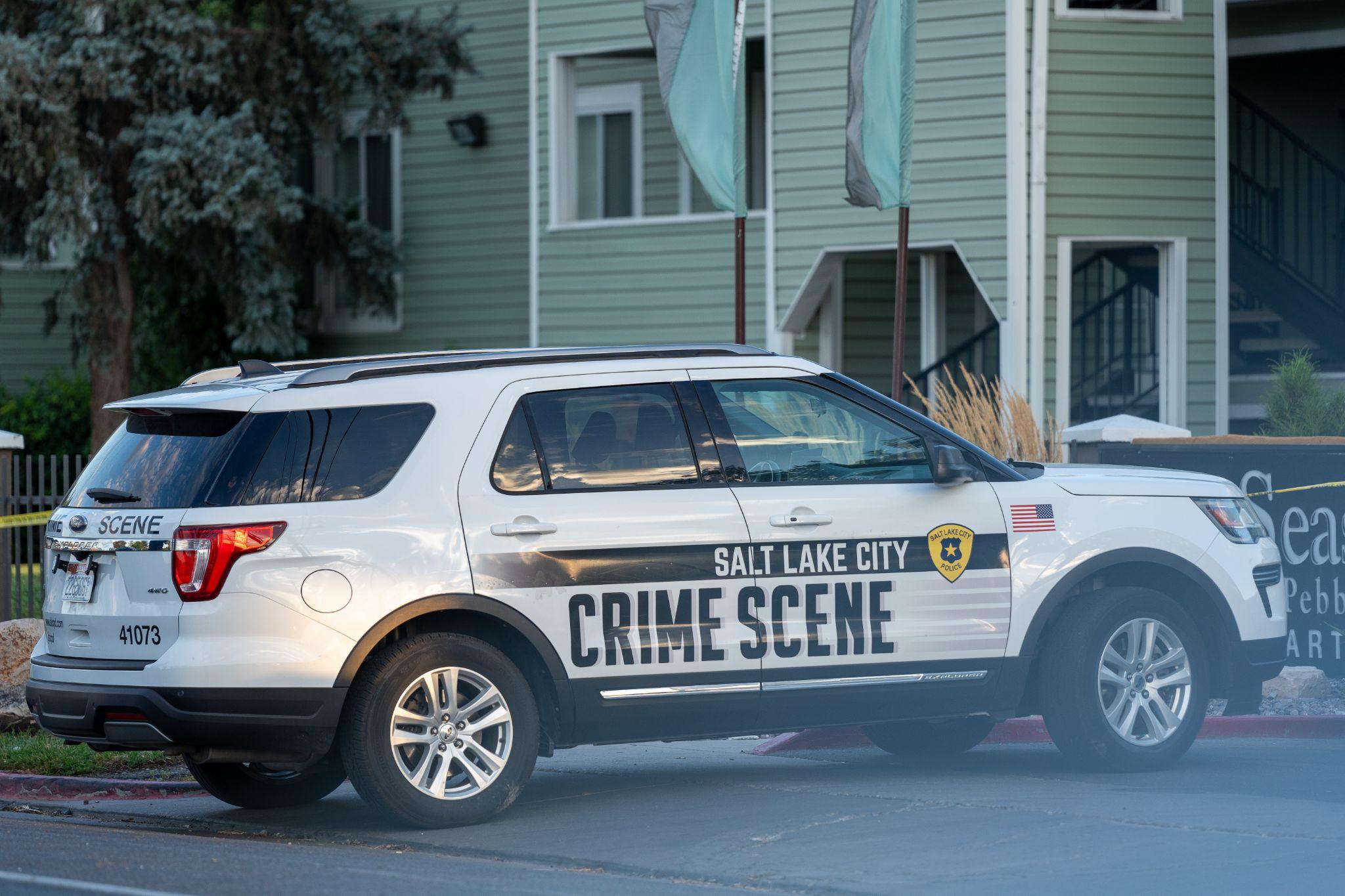 Salt Lake City police investigate scene of a homicide investigation near 1600 W. Snow Queen Place on Tuesday.