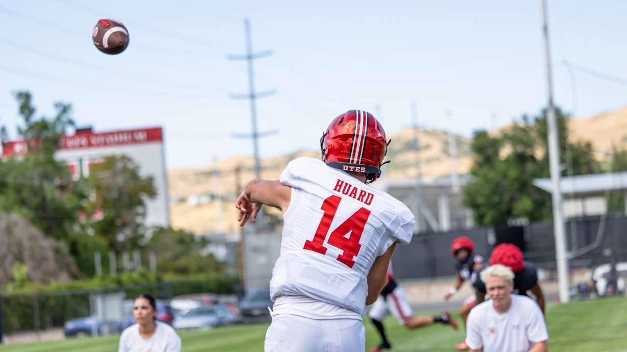 Utah backup quarterback Sam Huard throws a pass during practice on Aug. 5, 2024.