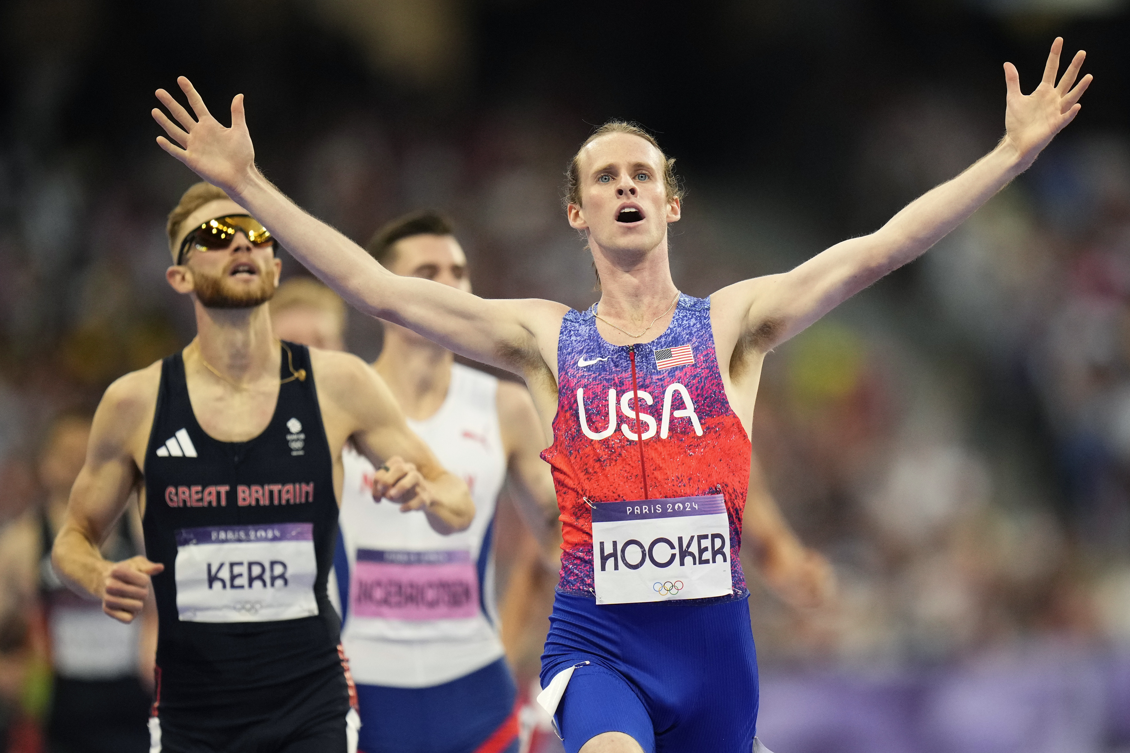 Cole Hocker, of the United States, celebrates after winning the men's 1500-meters final at the 2024 Summer Olympics, Tuesday, Aug. 6, 2024, in Saint-Denis, France.