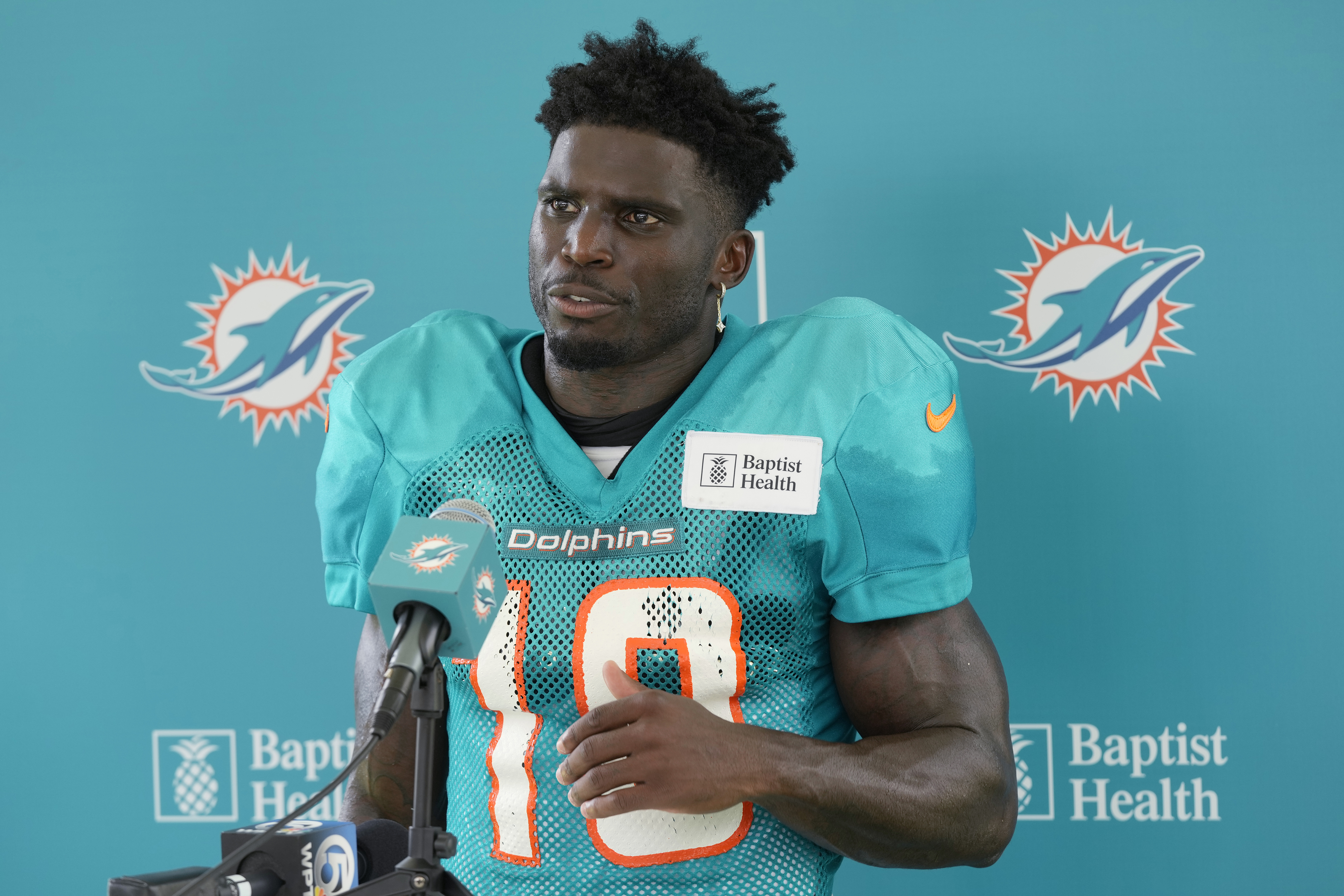 Miami Dolphins wide receiver Tyreek Hill (10) speaks after a joint NFL football practice with the Atlanta Falcons at the team's practice facility, Tuesday, Aug. 6, 2024, in Miami Gardens, Fla.