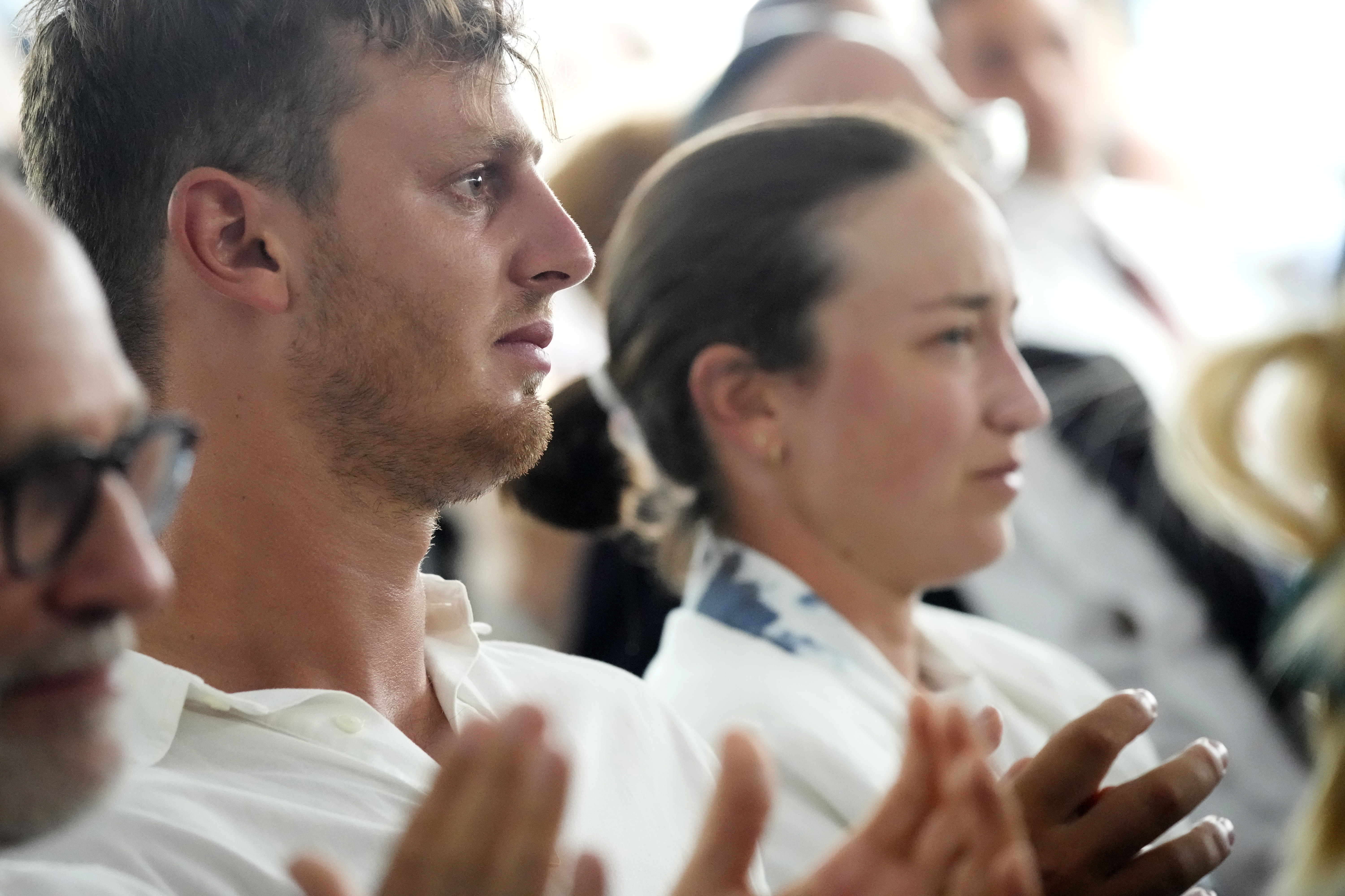 Israeli gold medalist windsurfer Tom Reuveni, left, and cyclist Rotem Gafinovitz, attend a ceremony in remembrance of the 11 Israeli athletes killed during the 1972 Munich Olympic Games, at the 2024 Summer Olympics, Tuesday, Aug. 6, 2024, in Paris, France.