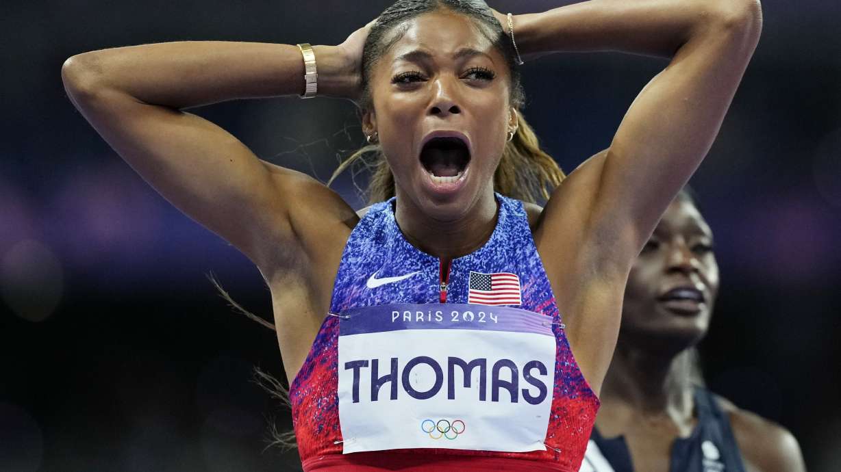 Gabrielle Thomas, of the United States, reacts after winning the women's 200-meters final at the 2024 Summer Olympics, Tuesday, Aug. 6, 2024, in Saint-Denis, France.