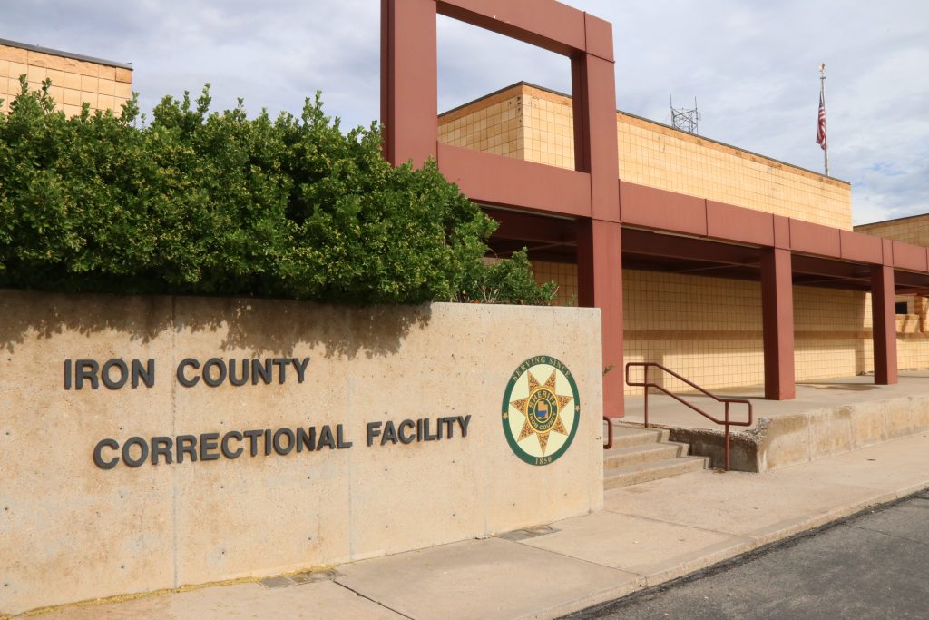 A Cedar City man who was admitted to the hospital for a gunshot wound to his hand has been charged with illegally possessing a stolen firearm.