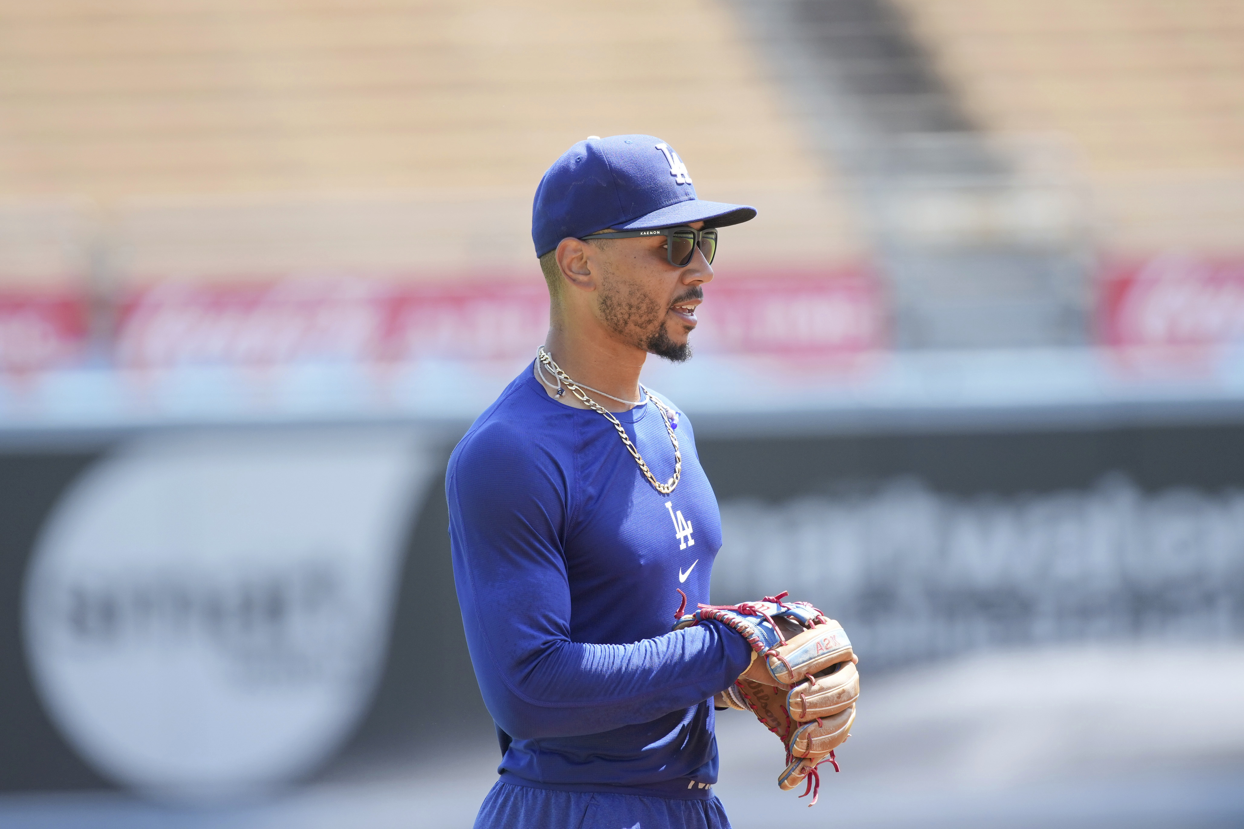 Los Angeles Dodgers' Mookie Betts works out prior to a baseball game against the San Francisco Giants in Los Angeles, Calif., Thursday, July 25, 2024. 