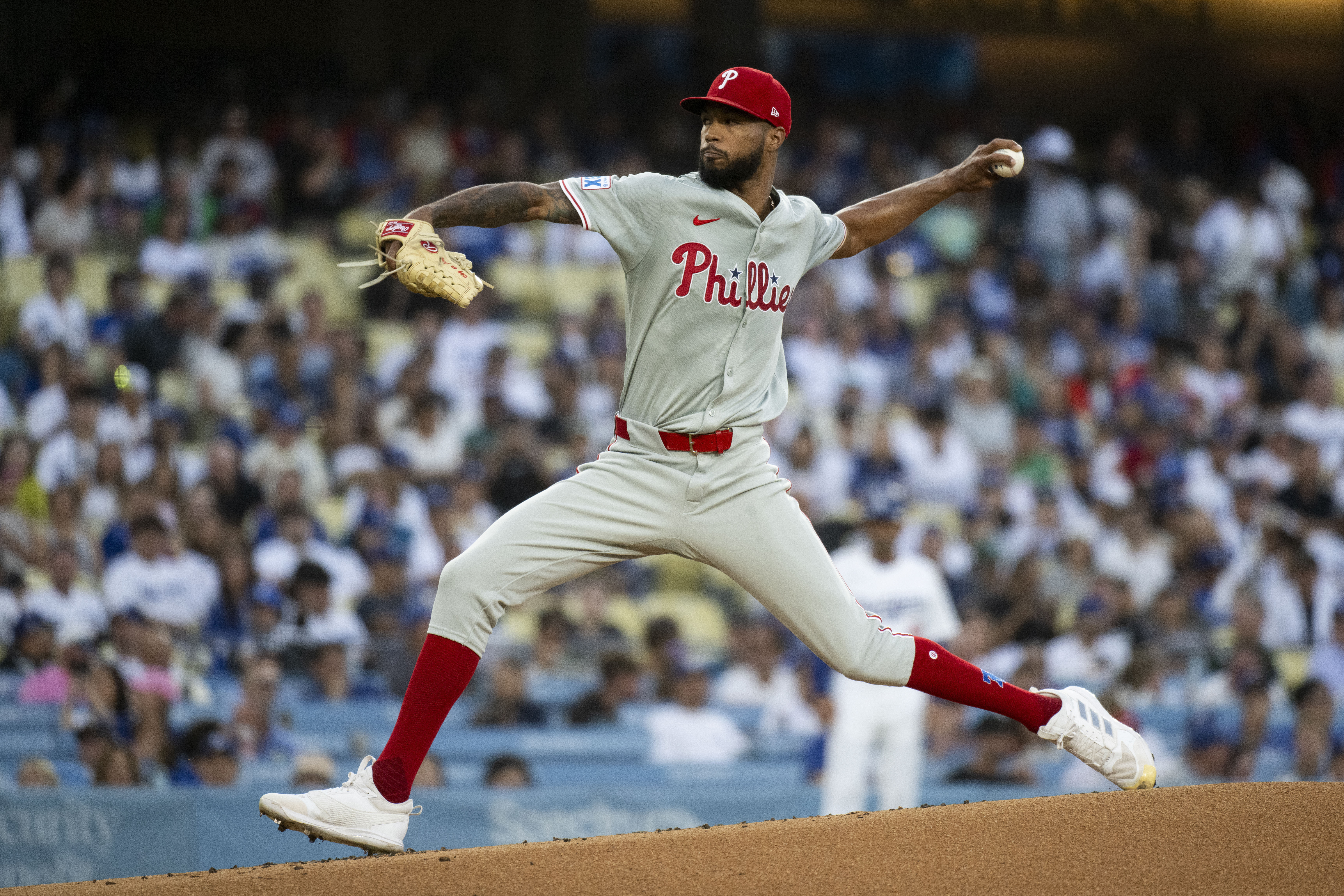 Philadelphia Phillies starting pitcher Cristopher Sánchez delivers a pitch during the first inning of a baseball game against the Los Angeles Dodgers in Los Angeles, Tuesday, Aug. 6, 2024. 