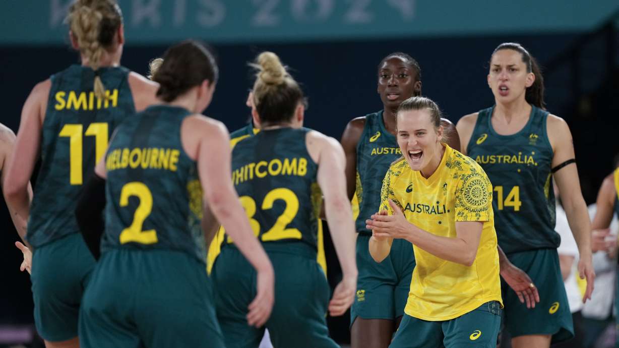 Team Australia celebrates after Serbia called a time out during a women's quarterfinal game at Bercy Arena at the 2024 Summer Olympics, Wednesday, Aug. 7, 2024, in Paris, France.