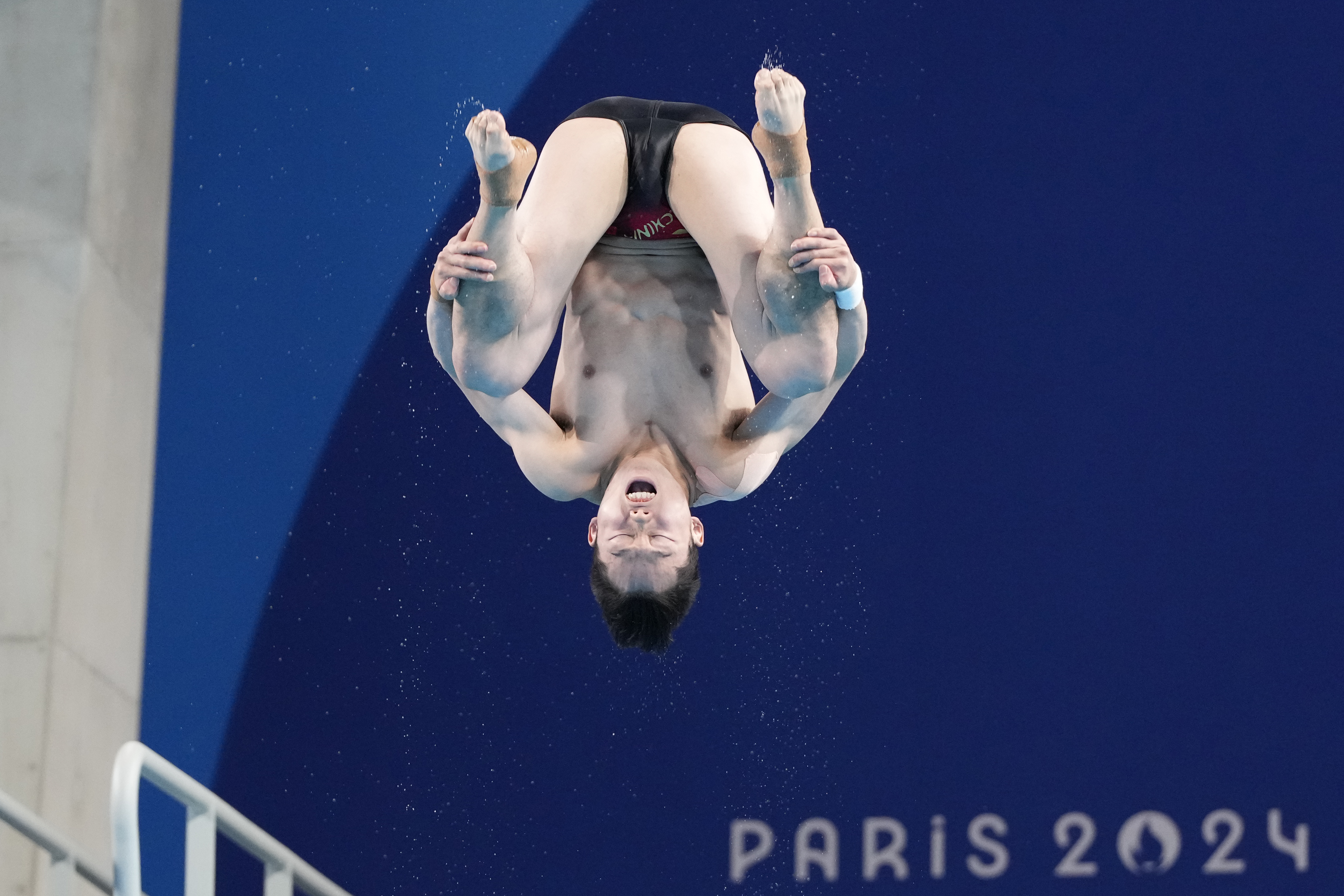 China's Wang Zongyuan competes in the men's 3m springboard diving semifinal, at the 2024 Summer Olympics, Wednesday, Aug. 7, 2024, in Saint-Denis, France. 