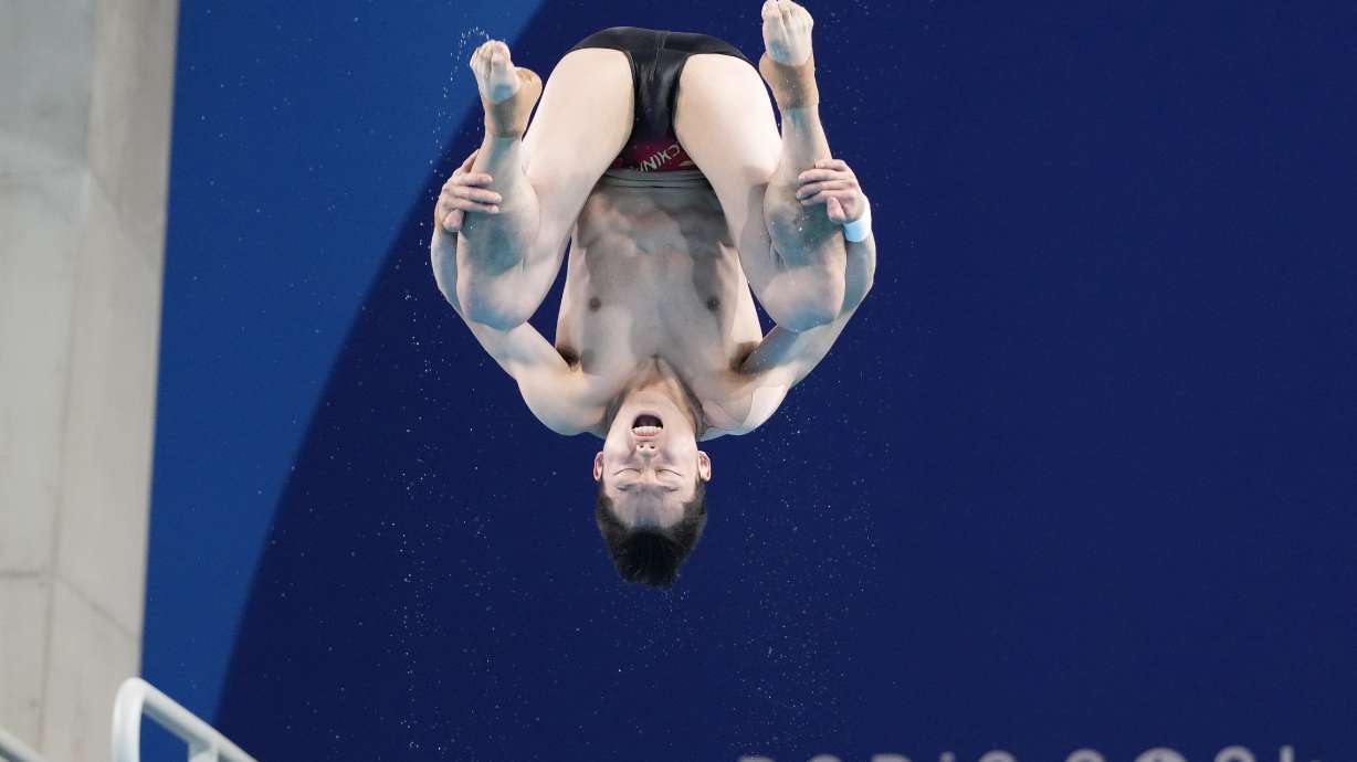 China's Wang Zongyuan competes in the men's 3m springboard diving semifinal, at the 2024 Summer Olympics, Wednesday, Aug. 7, 2024, in Saint-Denis, France.