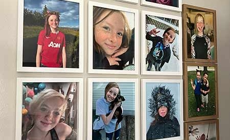 A montage of Lila Bradshaw’s photos are on display in Tristan Bradshaw’s home in this undated photo. Lila died in May. Her dad released an album on her behalf based on words she wrote.