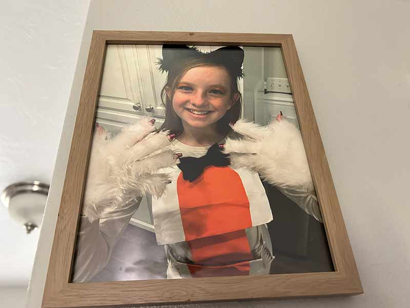 A photo of Lila Bradshaw sits in Tristan Bradshaw’s home.