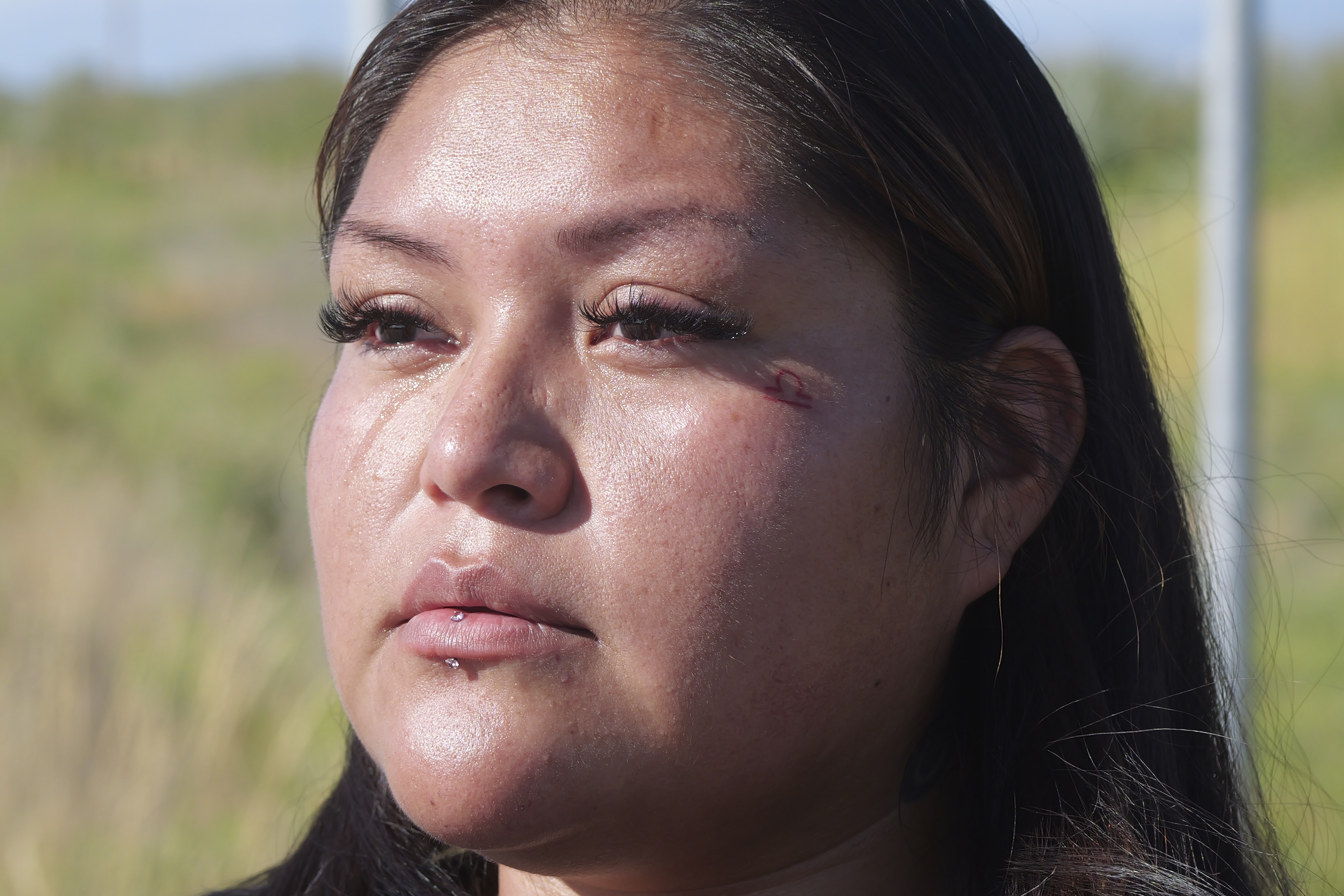 Tressa Honie, daughter of death row inmate Taberon Honie, is interviewed Tuesday near the Utah State Correctional Facility in Salt Lake City. 
