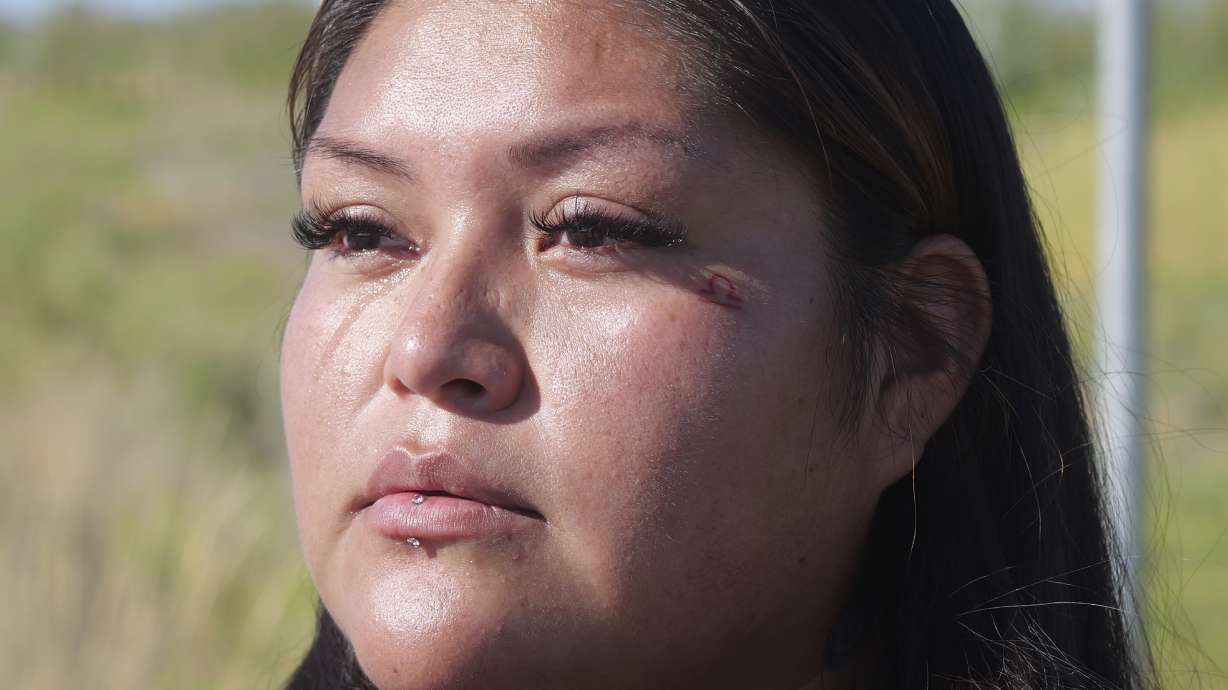 Tressa Honie, daughter of death row inmate Taberon Honie, is interviewed Tuesday near the Utah State Correctional Facility in Salt Lake City.