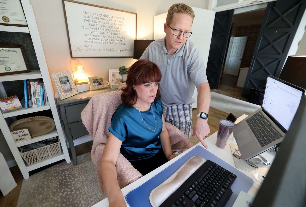 Crystal Pickering, a recent Master of Science graduate of Western Governors University, works at home in Herriman on Tuesday.