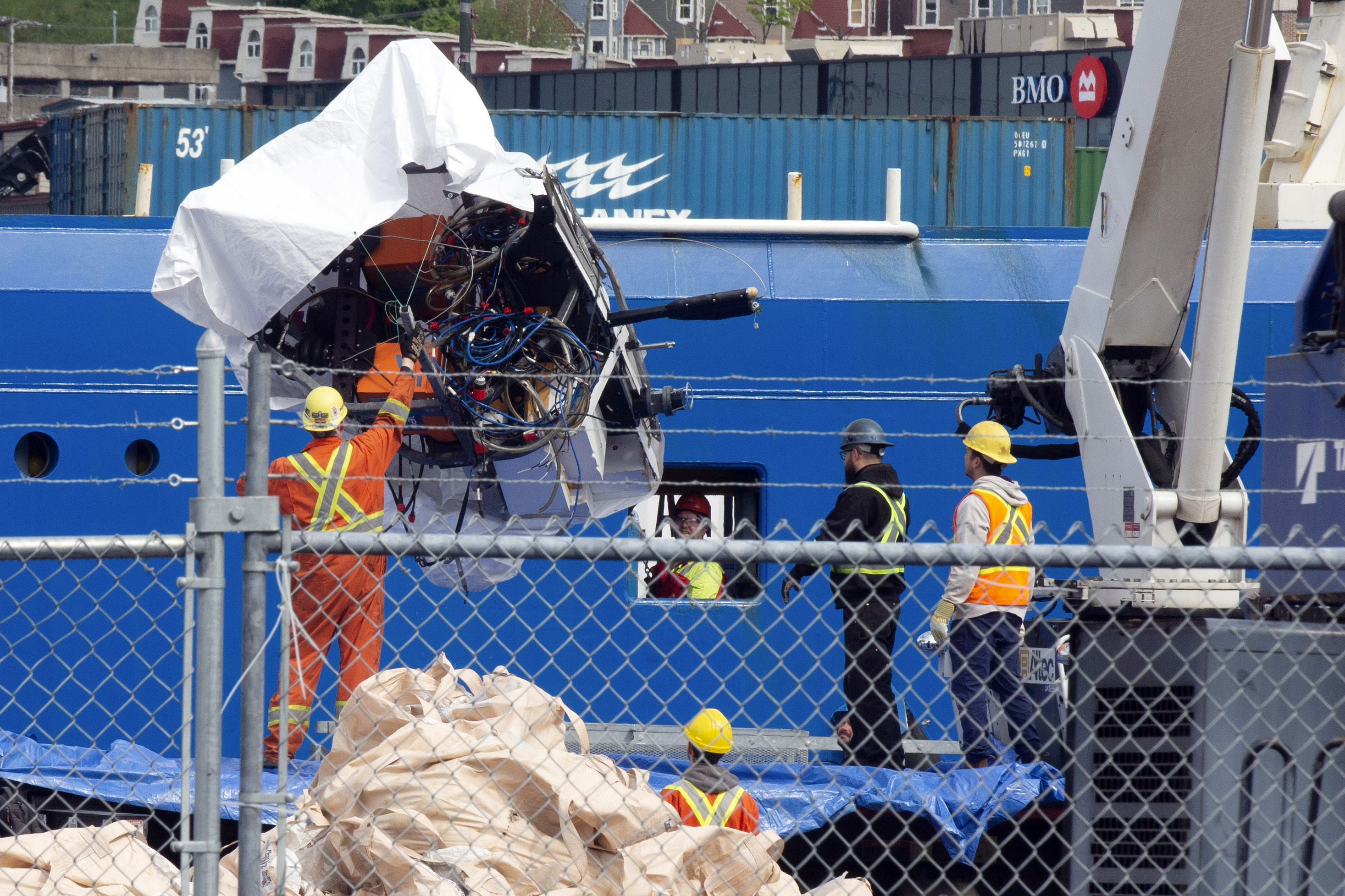 Debris from the Titan submersible is unloaded from the ship Horizon Arctic at the Canadian Coast Guard pier in St. John's, Canada, June 28, 2023. A lawsuit of over $50 million has been filed over the disaster.