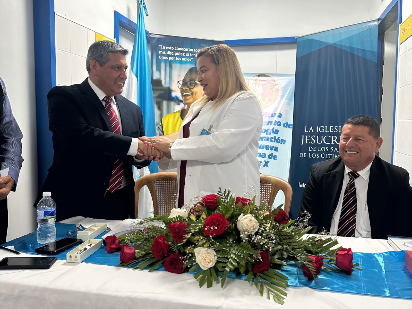 The director of Tela Hospital in San Pedro Sula, Honduras, thanks Elder Patricio M. Giuffra Vargas, member of the Central America Area Presidency of The Church of Jesus Christ of Latter-day Saints, for a donation on July 31.