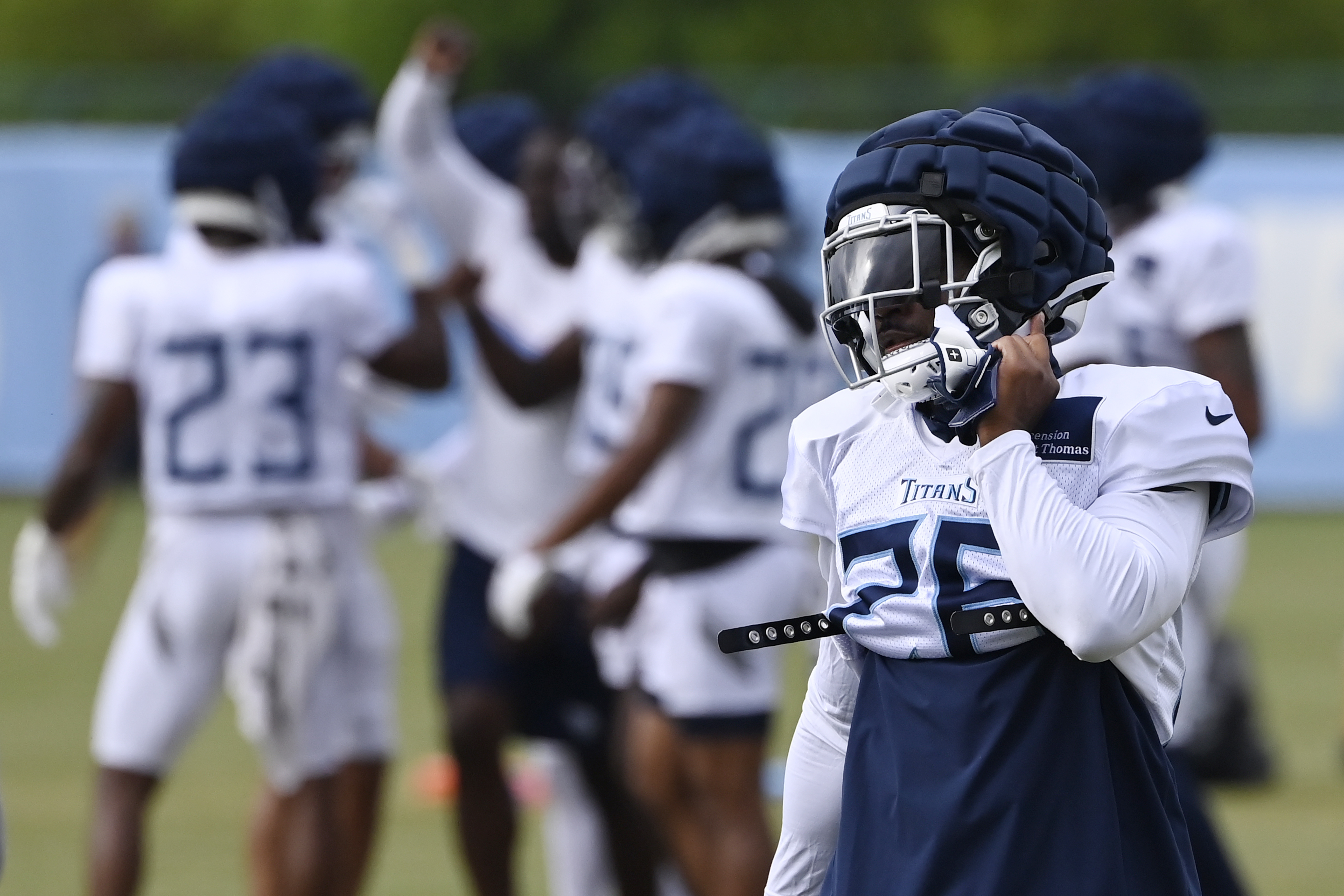 Tennessee Titans safety Quandre Diggs, right, waits for the next drill to start during an NFL football training camp practice Wednesday, Aug. 7, 2024, in Nashville, Tenn.