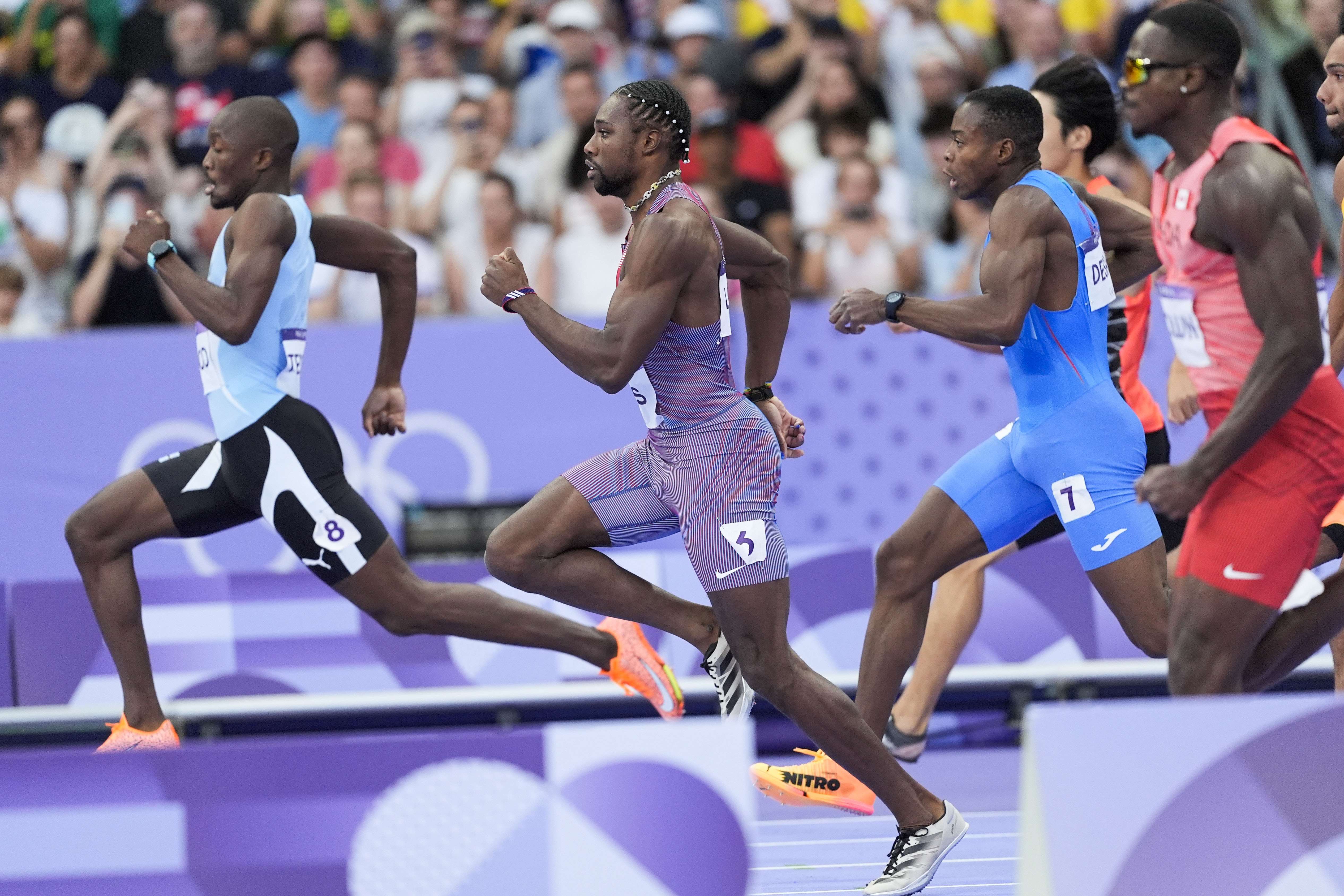 Noah Lyles, of the United States, competes during the men's 200-meter semifinal at the 2024 Summer Olympics, Wednesday, Aug. 7, 2024, in Saint-Denis, France.
