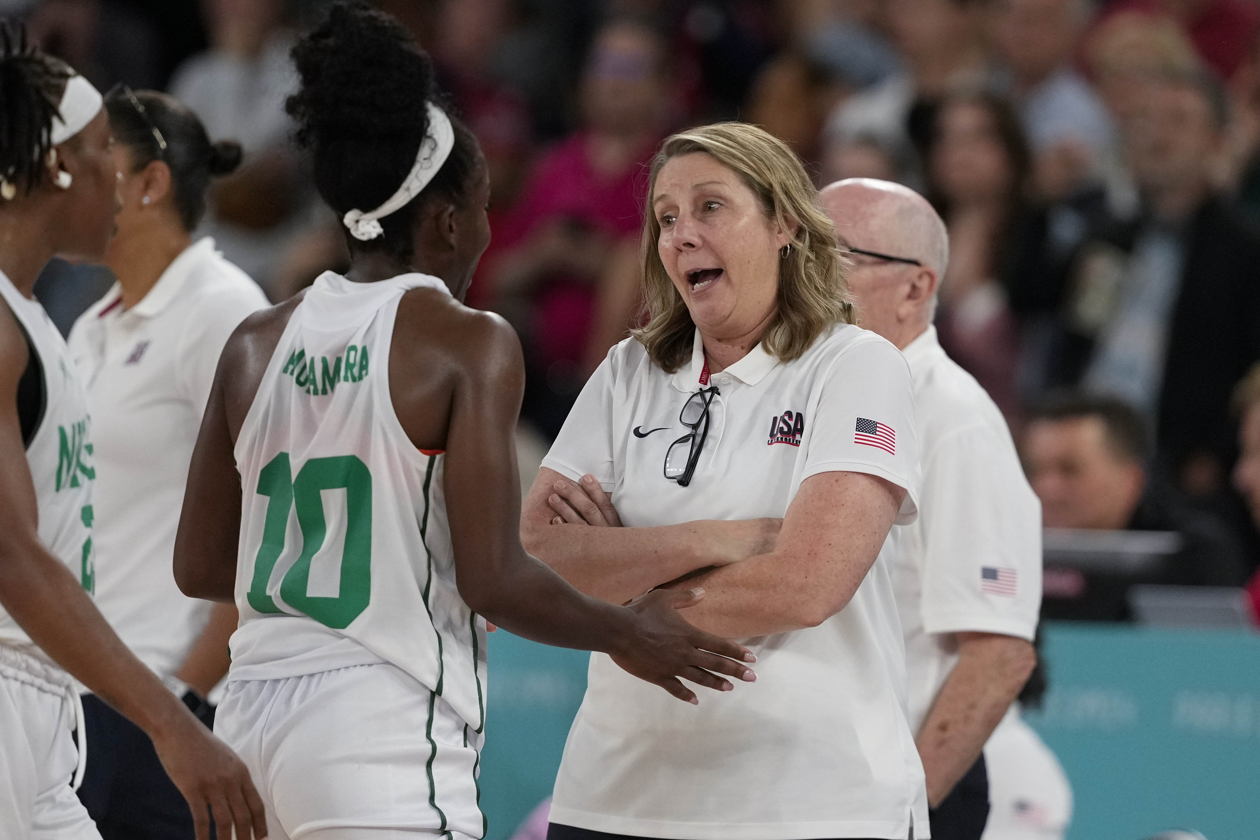 United States' Cheryl Reeve talks with Promise Amukamara (10), of Nigeria, following a women's quarterfinal game at Bercy Arena at the 2024 Summer Olympics, Wednesday, Aug. 7, 2024, in Paris, France. 