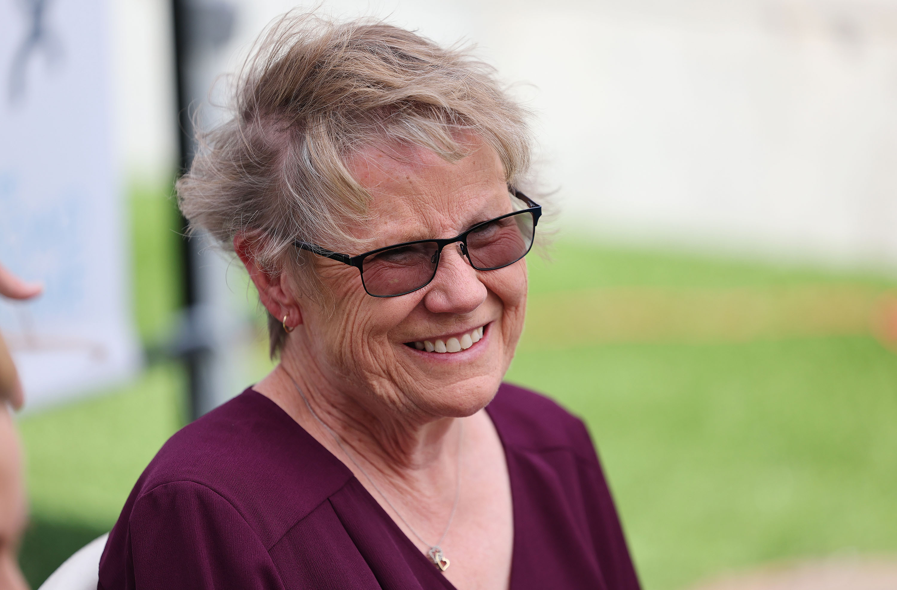Connie Crosby smiles during the Road Home dedication for the Connie Crosby Midvale Family Resource Center that was named after her in Midvale on Wednesday.