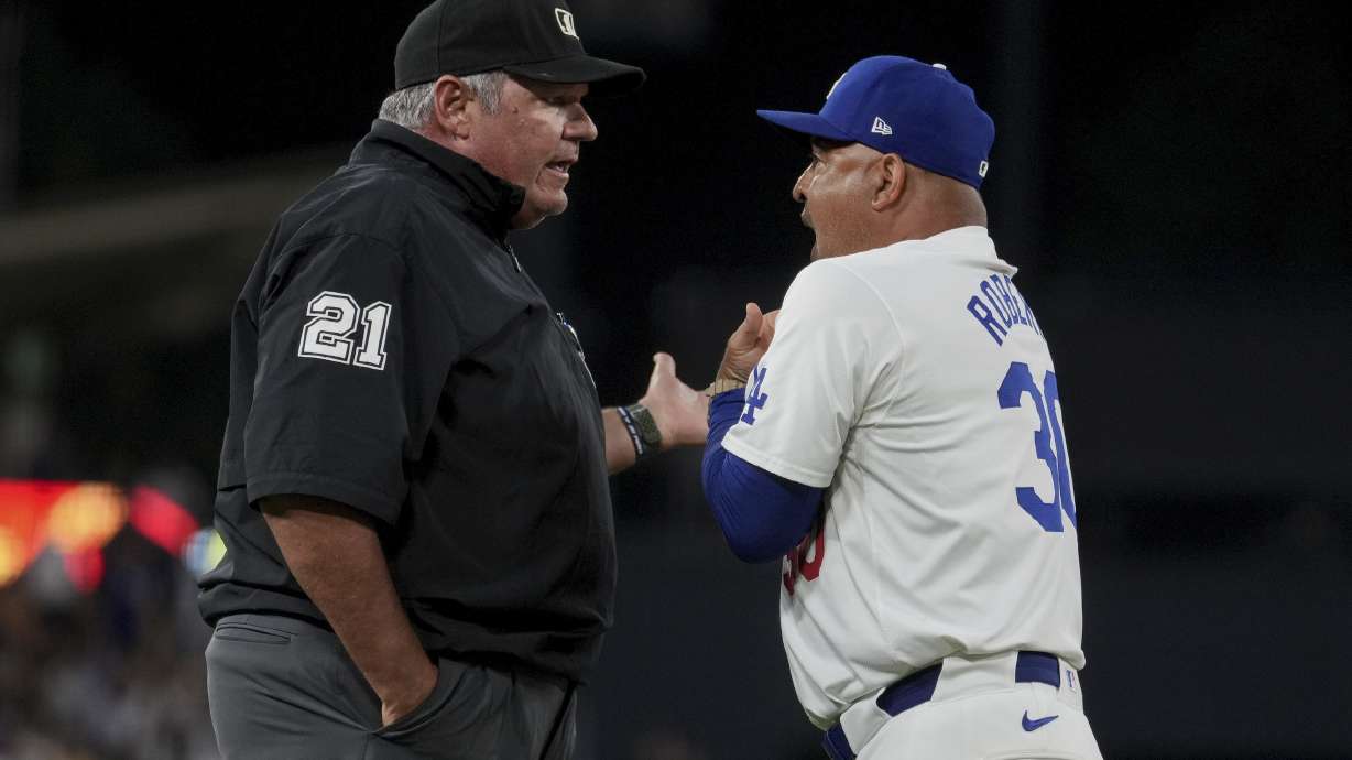 Los Angeles Dodgers manager Dave Roberts is ejected during the sixth inning of a baseball game against Philadelphia Phillies in Los Angeles, Wednesday, Aug. 7, 2024.
