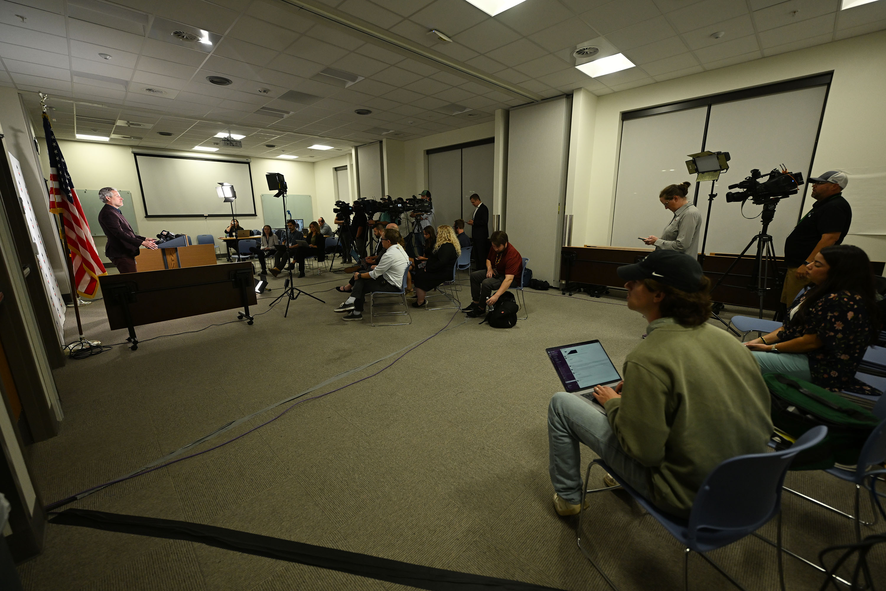 Media listen as Glen Mills, Utah Department of Corrections spokesperson, gives his final press conference inside the Stephen R. Anderson Memorial Building at the Utah State Correctional Facility in Salt Lake City, prior to the execution of Taberon Dave Honie, on Wednesday. - Scott G Winterton, Deseret News