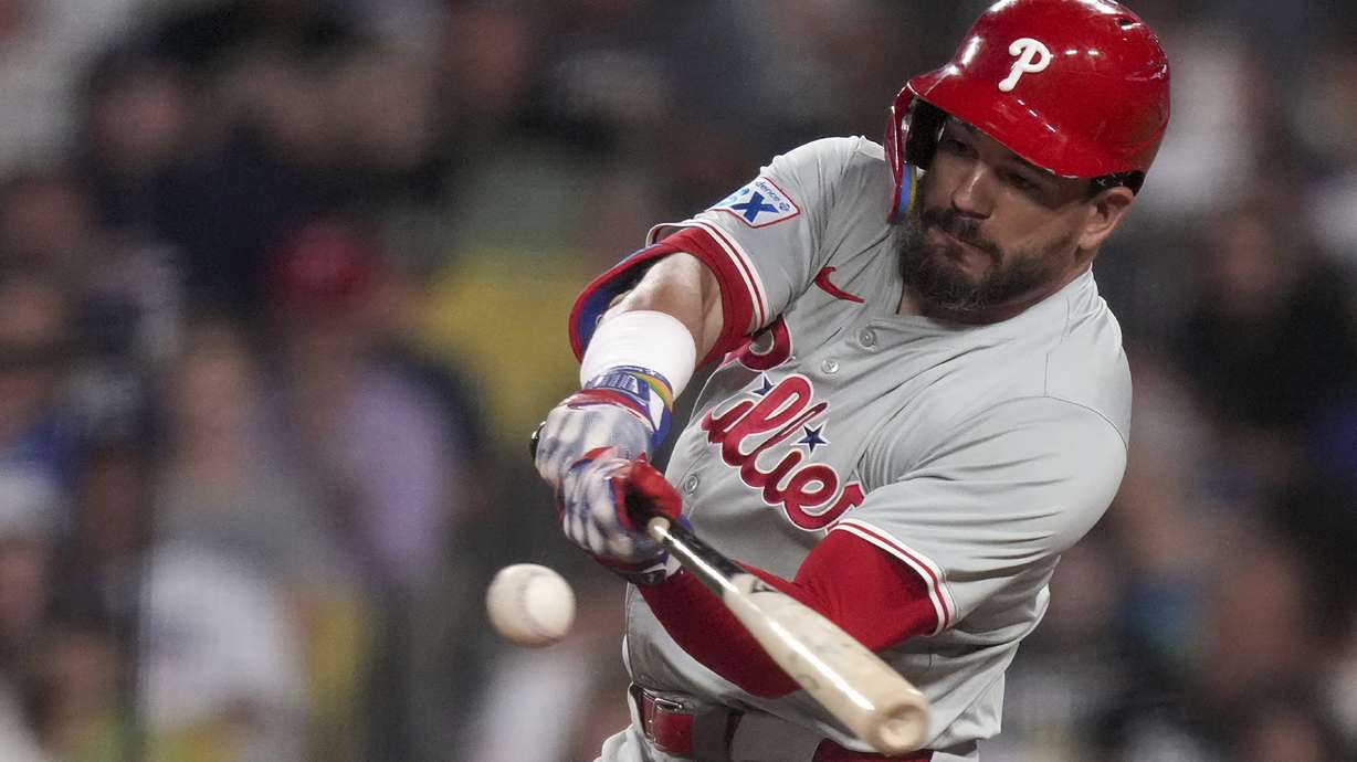 Philadelphia Phillies designated hitter Kyle Schwarber hits a home run during the sixth inning of a baseball game against Los Angeles Dodgers in Los Angeles, Wednesday, Aug. 7, 2024.
