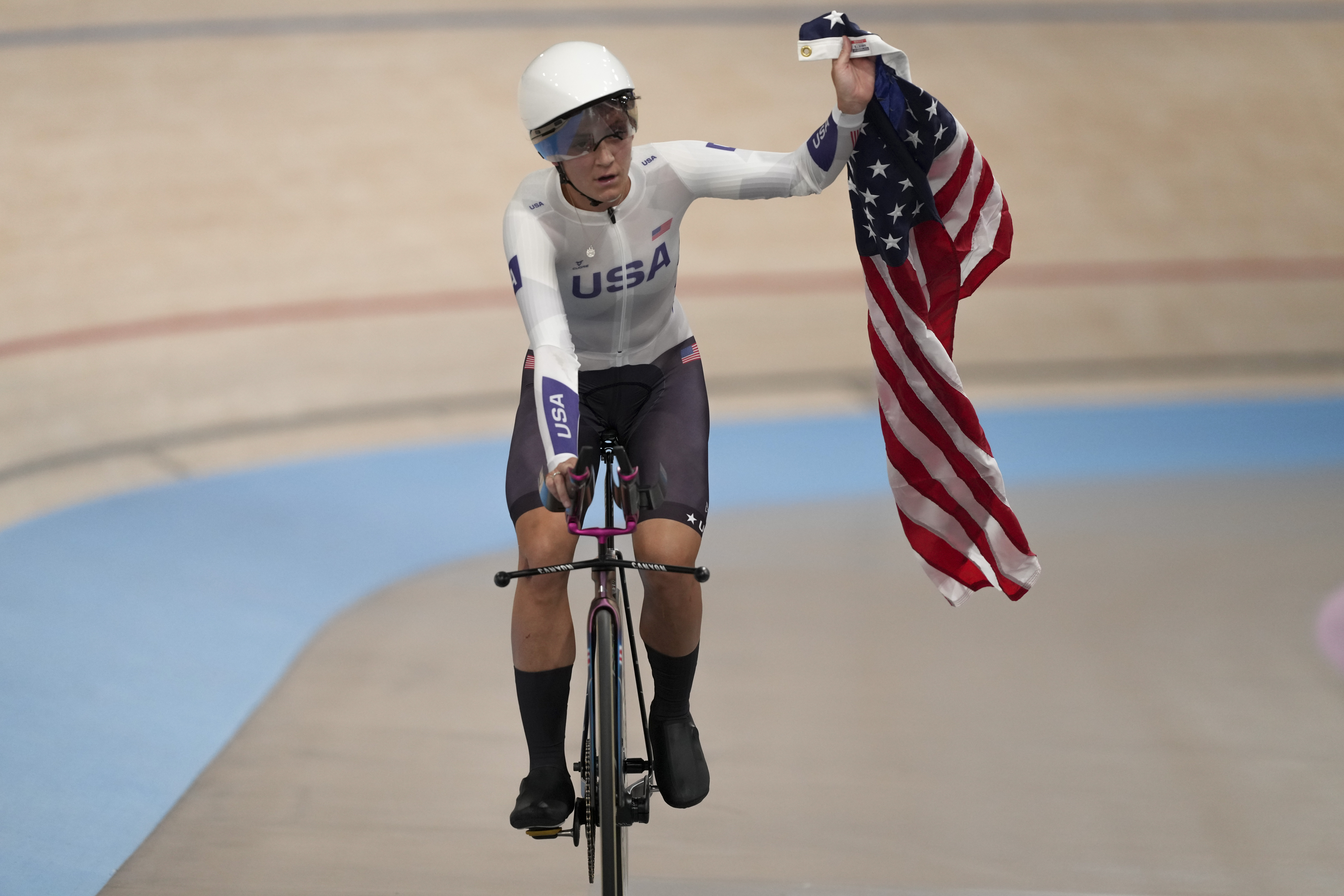 Chloe Dygert of the United States celebrates winning the gold medal in the women's team pursuit event, at the Summer Olympics, Wednesday, Aug. 7, 2024, in Paris, France. 