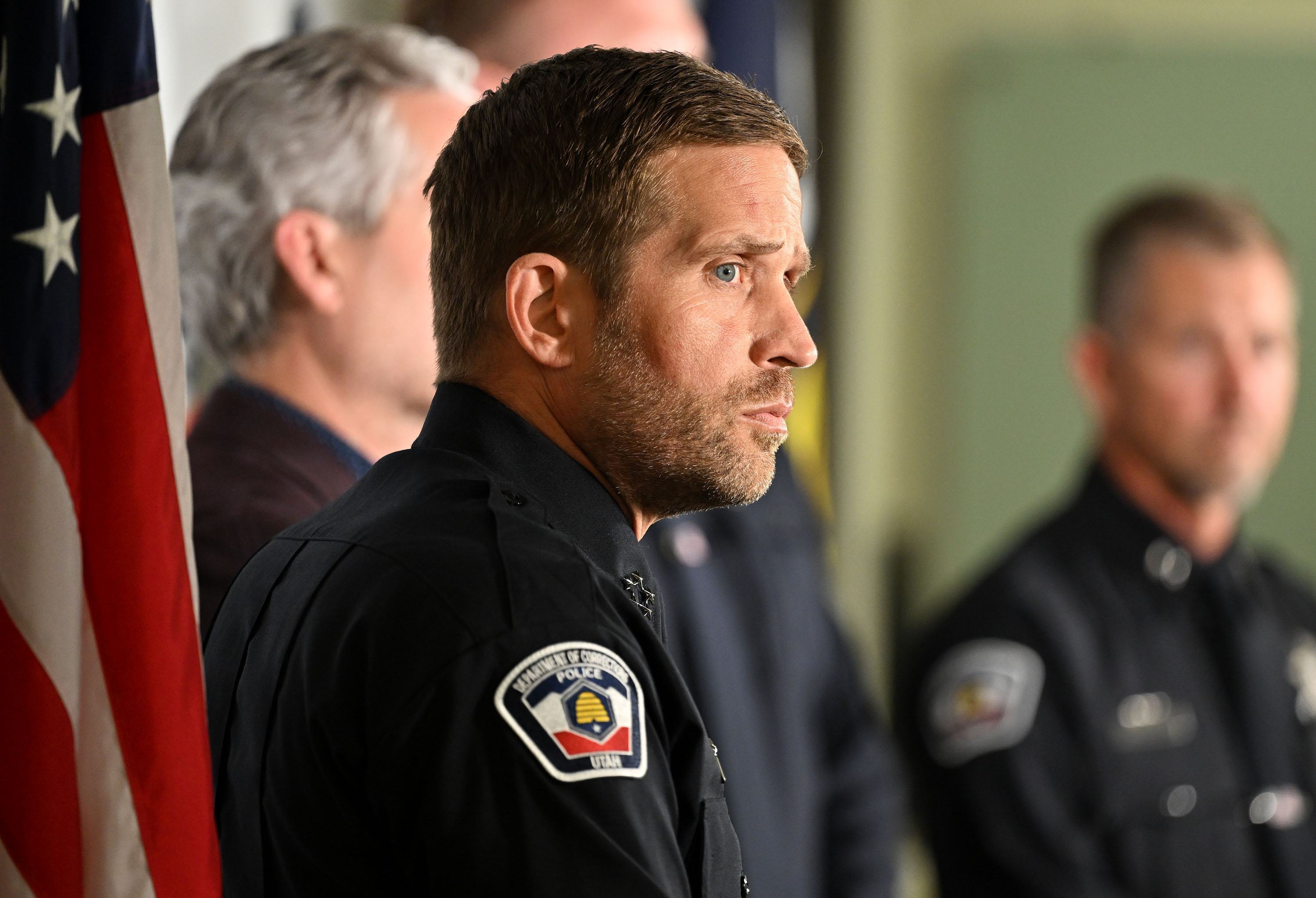 Brian Redd, executive director of the Utah Department of Corrections, looks around the room as members of the media who were witnesses to the execution of Taberon Honie, describe what they saw during a press conference at the Utah State Correctional Facility in Salt Lake City early Thursday.