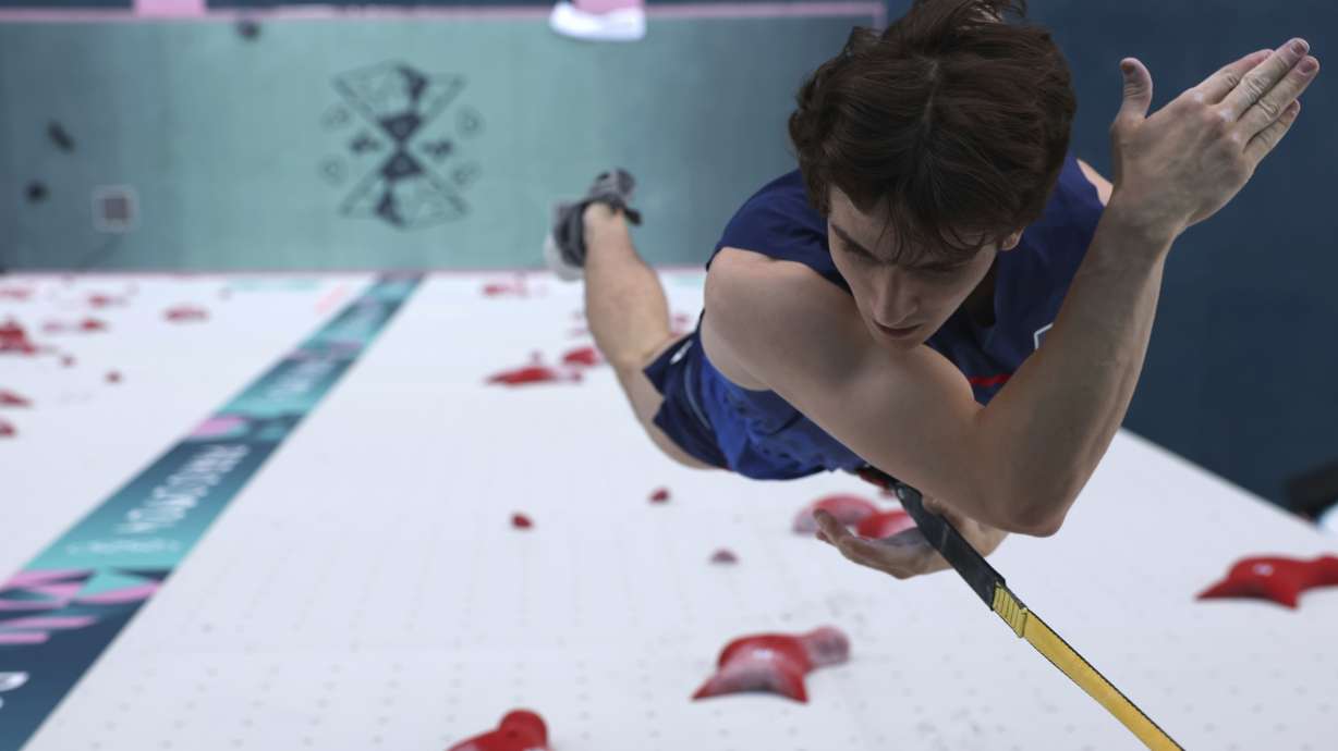 Sam Watson of the United States competes in the men's speed small final during the sport climbing competition at the 2024 Summer Olympics, Thursday, Aug. 8, 2024, in Le Bourget, France.