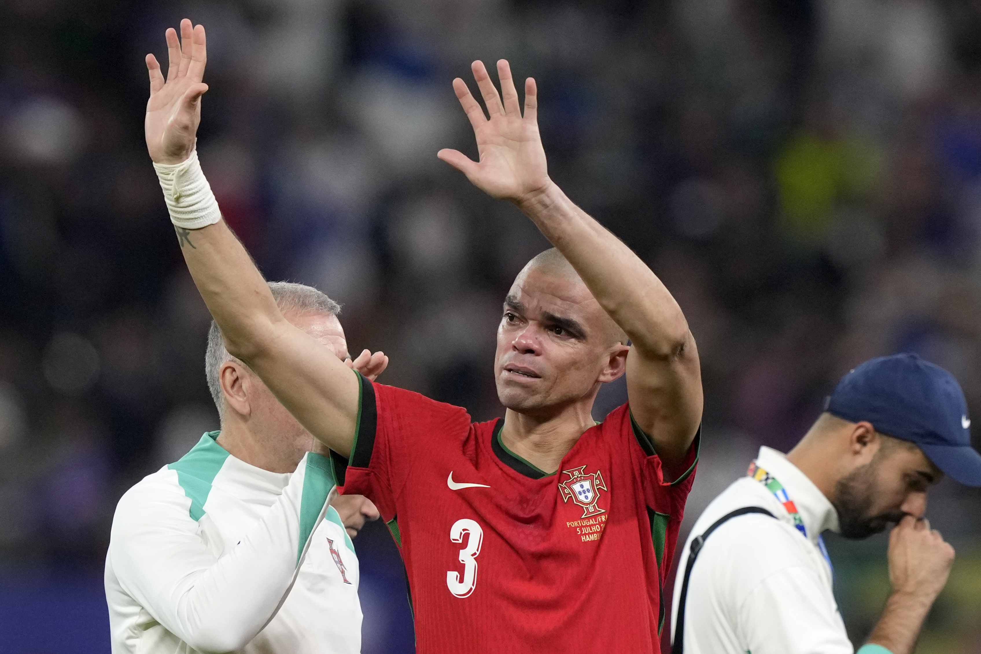 FILE - Portugal's Pepe cries after losing a quarter final match between Portugal and France at the Euro 2024 soccer tournament in Hamburg, Germany, July 5, 2024. 