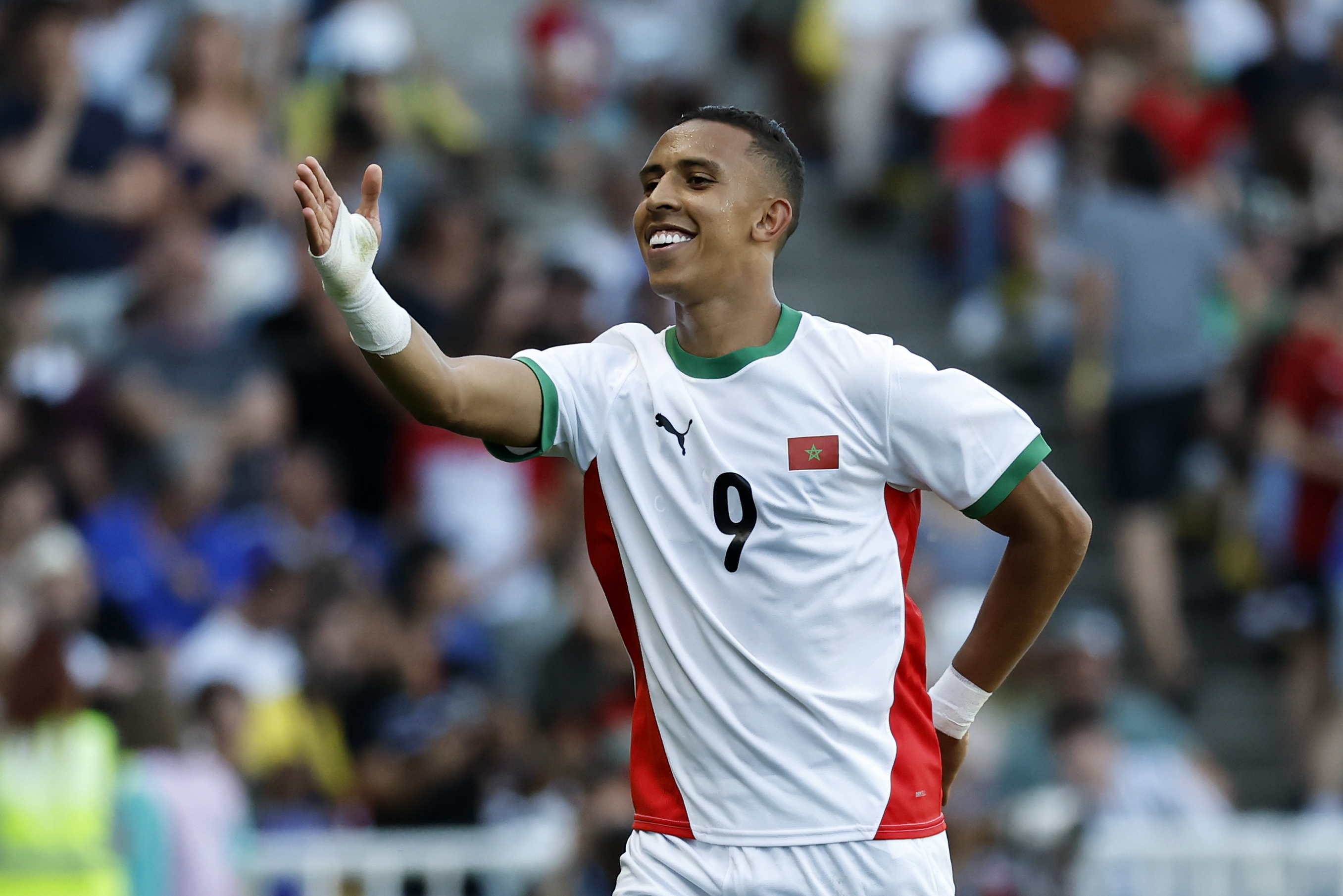 Morocco's Soufiane Rahimi celebrates after scoring his side's fourth goal during the men's bronze medal soccer match at the 2024 Summer Olympics, Thursday, Aug. 8, 2024, in Nantes, France.