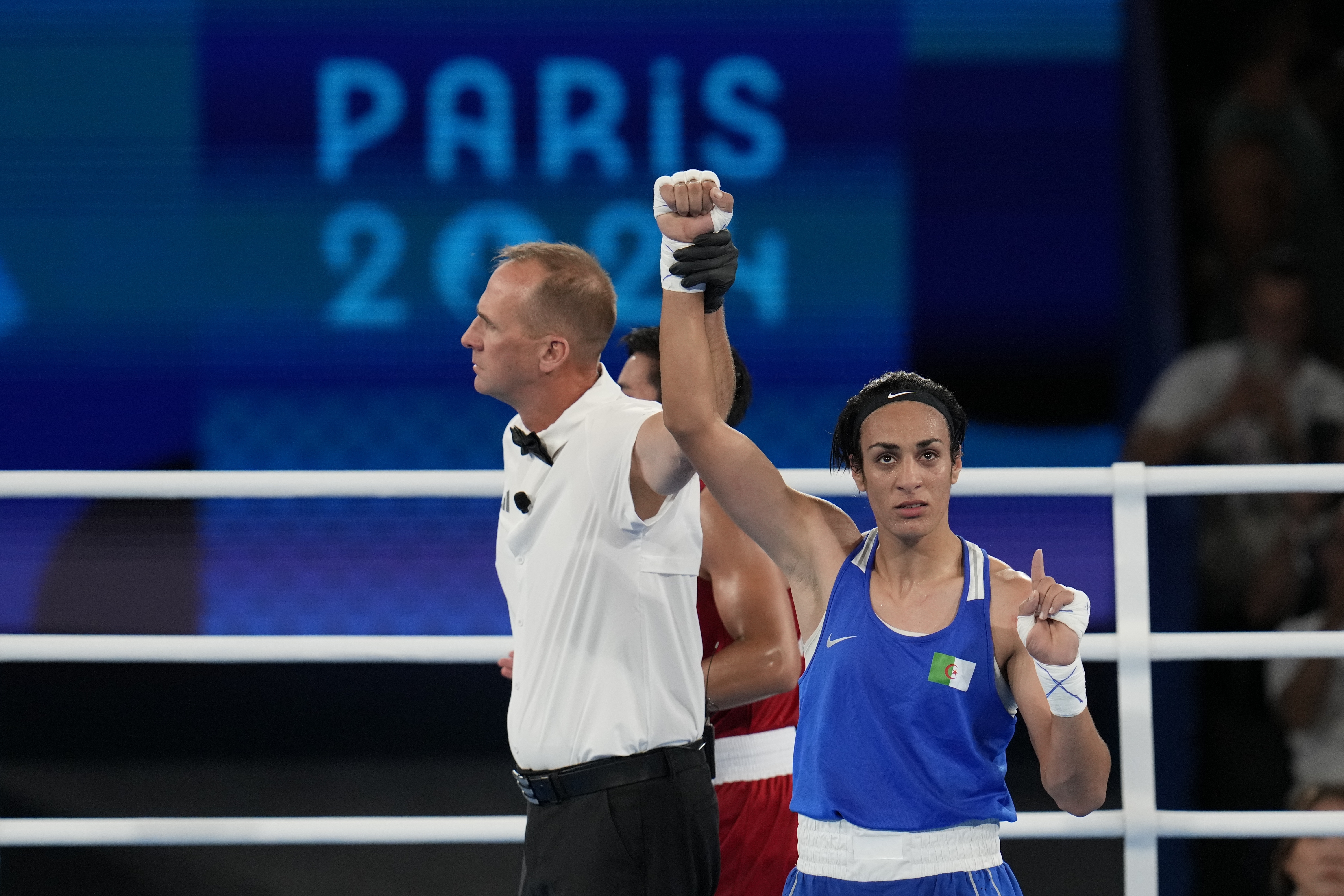 Algeria's Imane Khelif gestures after defeating Thailand's Janjaem Suwannapheng in their women's 66 kg semifinal boxing match at the 2024 Summer Olympics, Tuesday, Aug. 6, 2024, in Paris, France. 