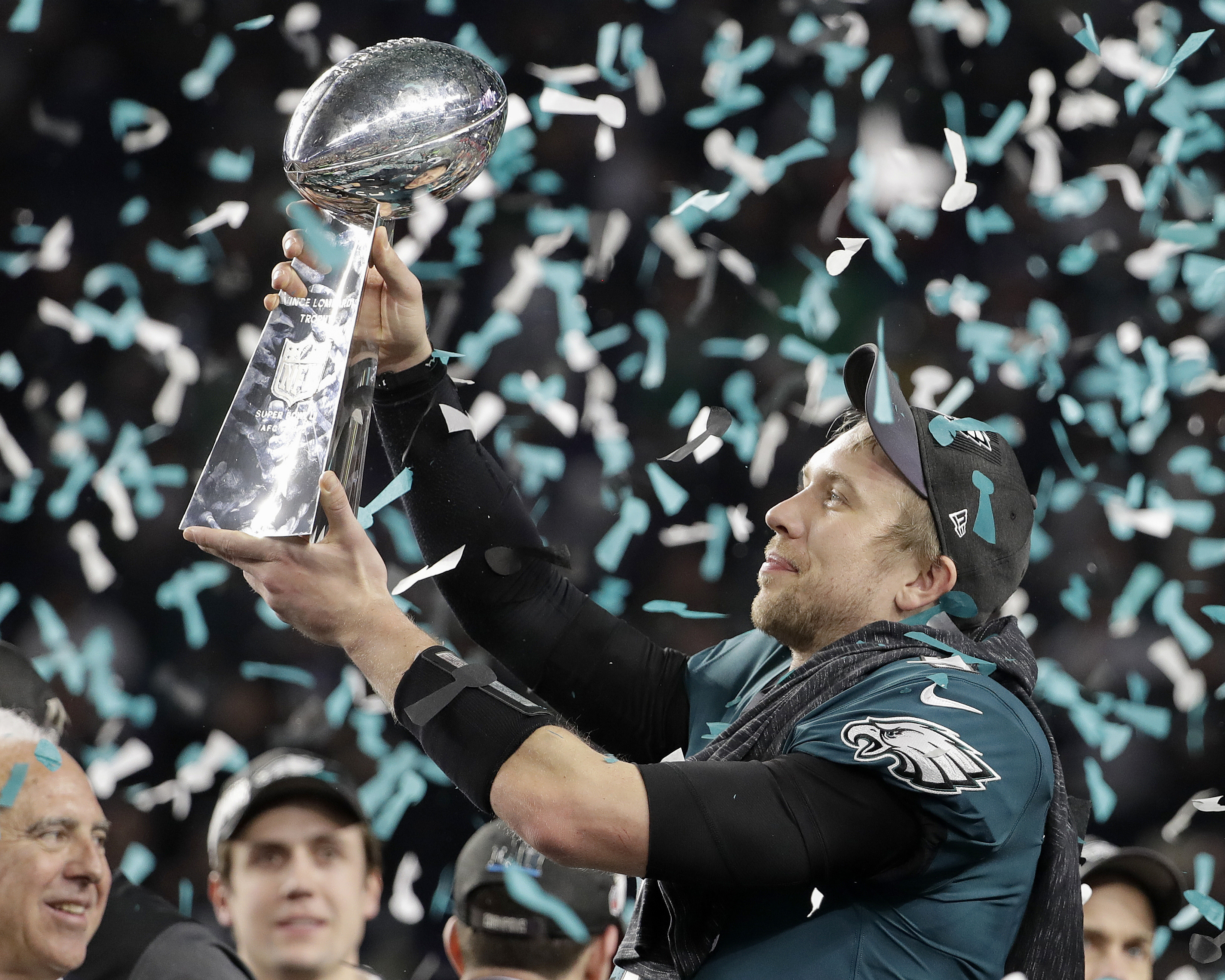 FILE - Philadelphia Eagles' Nick Foles holds up the Vince Lombardi Trophy after the NFL Super Bowl 52 football game against the New England Patriots, Sunday, Feb. 4, 2018, in Minneapolis. 