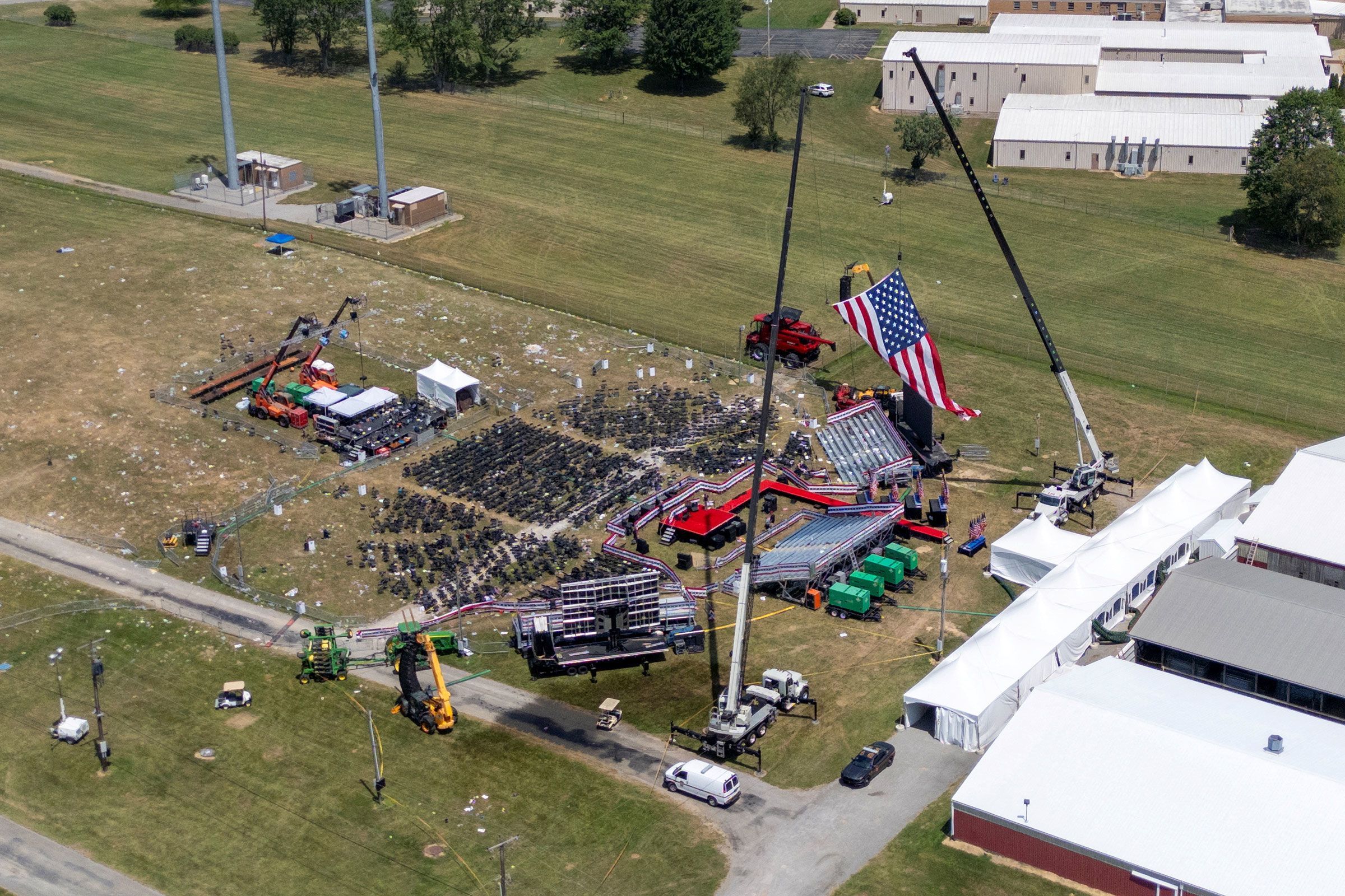 A drone view shows the stage where former President Donald Trump had been standing during an assassination attempt the day before, and the roof of a nearby building where a gunman was shot dead by law enforcement, in Butler, Pen., on July 14.