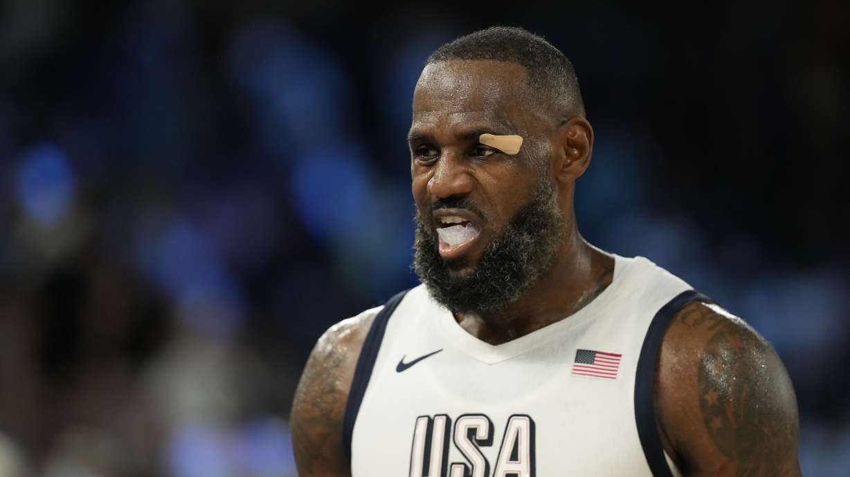 United States' LeBron James (6) reacts to a call against Serbia during a men's semifinals basketball game at Bercy Arena at the 2024 Summer Olympics, Thursday, Aug. 8, 2024, in Paris, France.