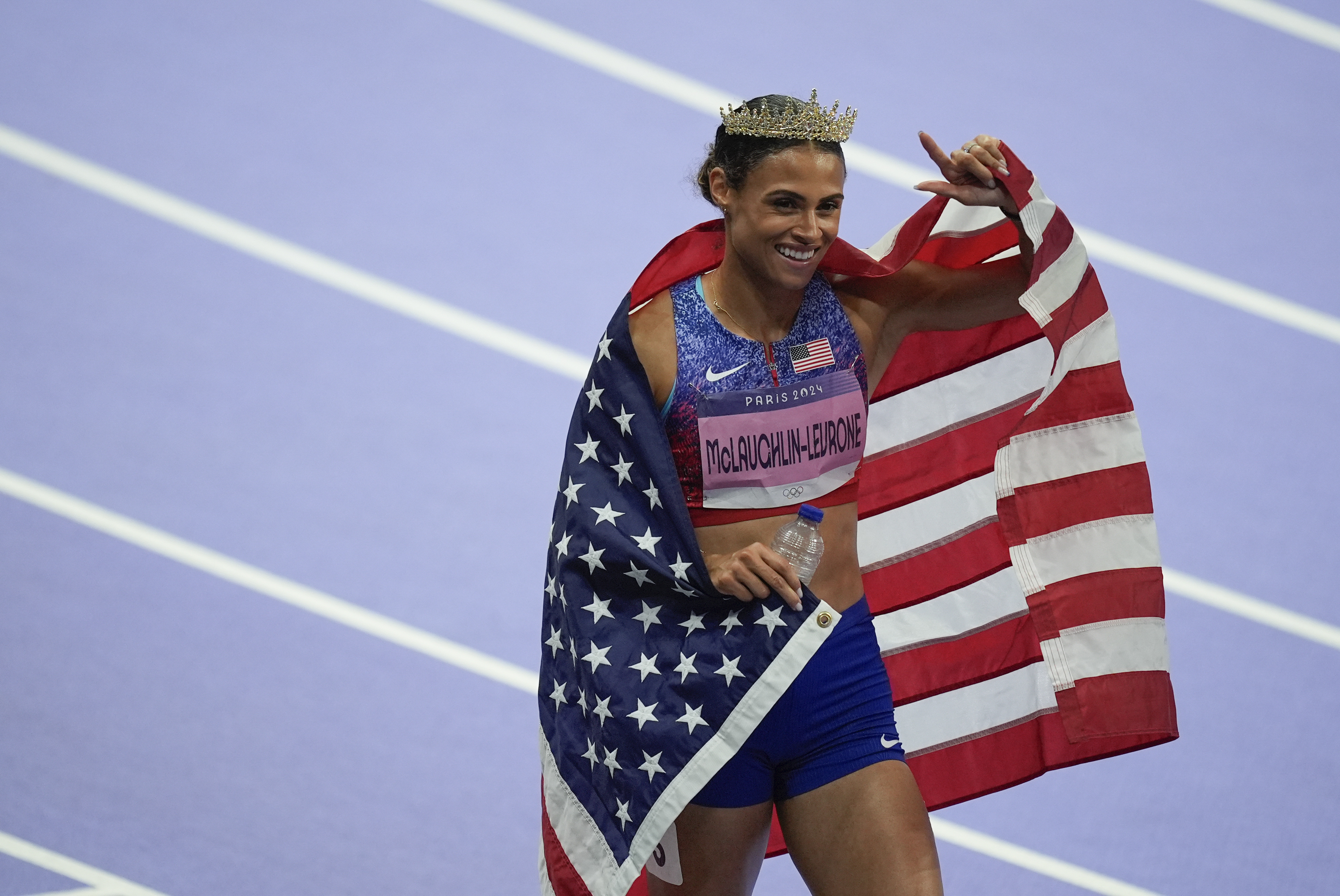 Sydney McLaughlin-Levrone, of the United States celebrates winning gold in the women's 400-meter hurdles final, at the 2024 Summer Olympics, Thursday, Aug. 8, 2024, in Saint-Denis, France. 