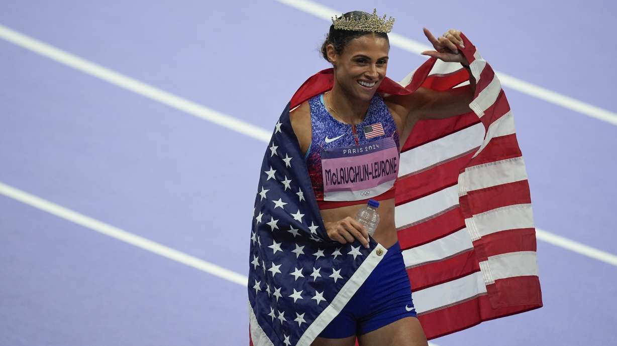 Sydney McLaughlin-Levrone, of the United States celebrates winning gold in the women's 400-meter hurdles final, at the 2024 Summer Olympics, Thursday, Aug. 8, 2024, in Saint-Denis, France.